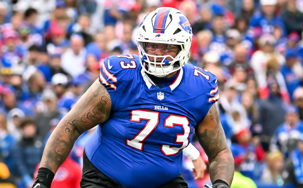 Nov 3, 2024; Orchard Park, New York, USA; Buffalo Bills offensive tackle Dion Dawkins (73) looks to make a block down field against the Miami Dolphins in the third quarter at Highmark Stadium.