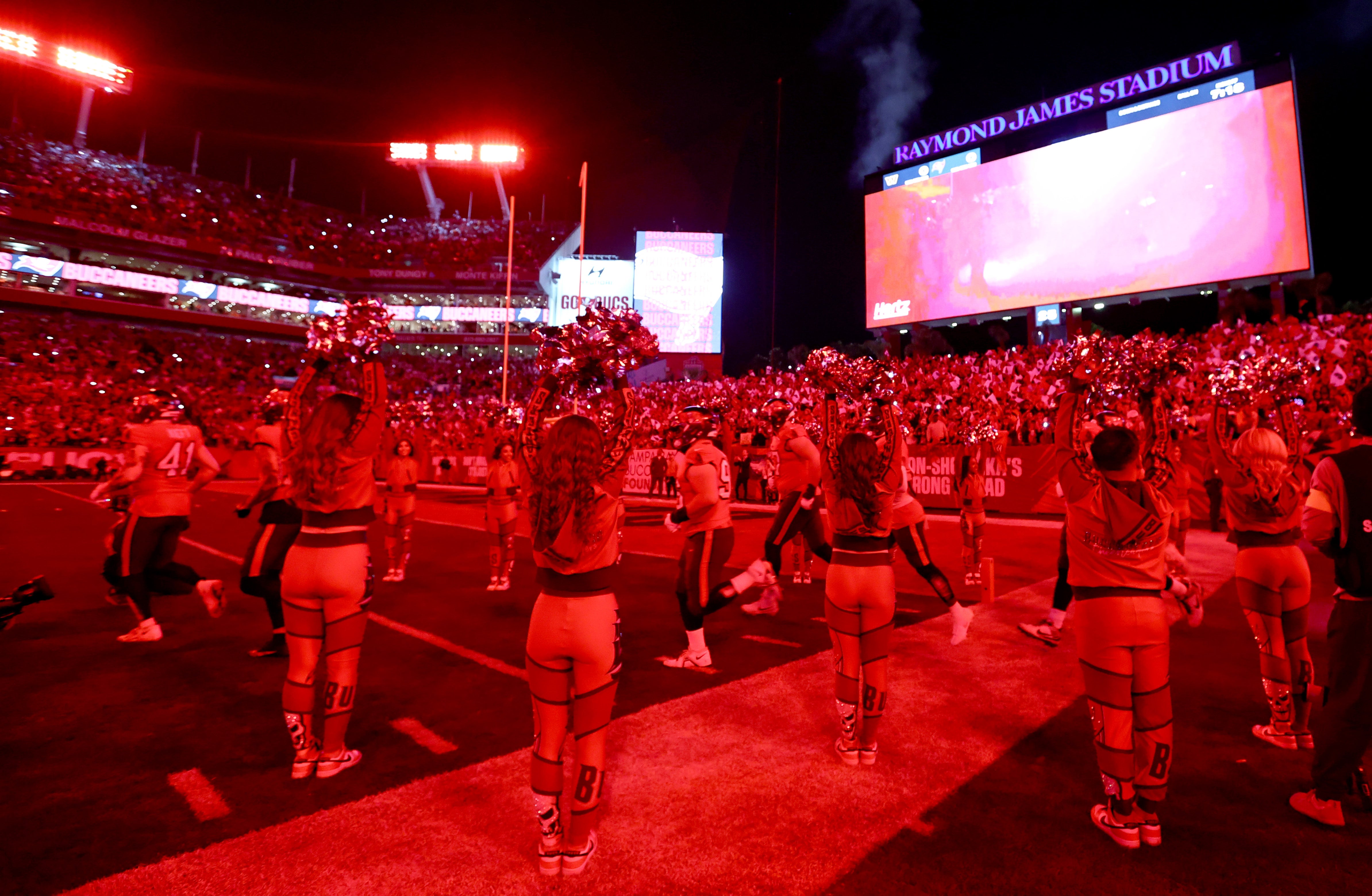 Jan 12, 2025; Tampa, Florida, USA; Tampa Bay Buccaneers take the field before a NFC wild card playoff against the Washington Commanders at Raymond James Stadium.