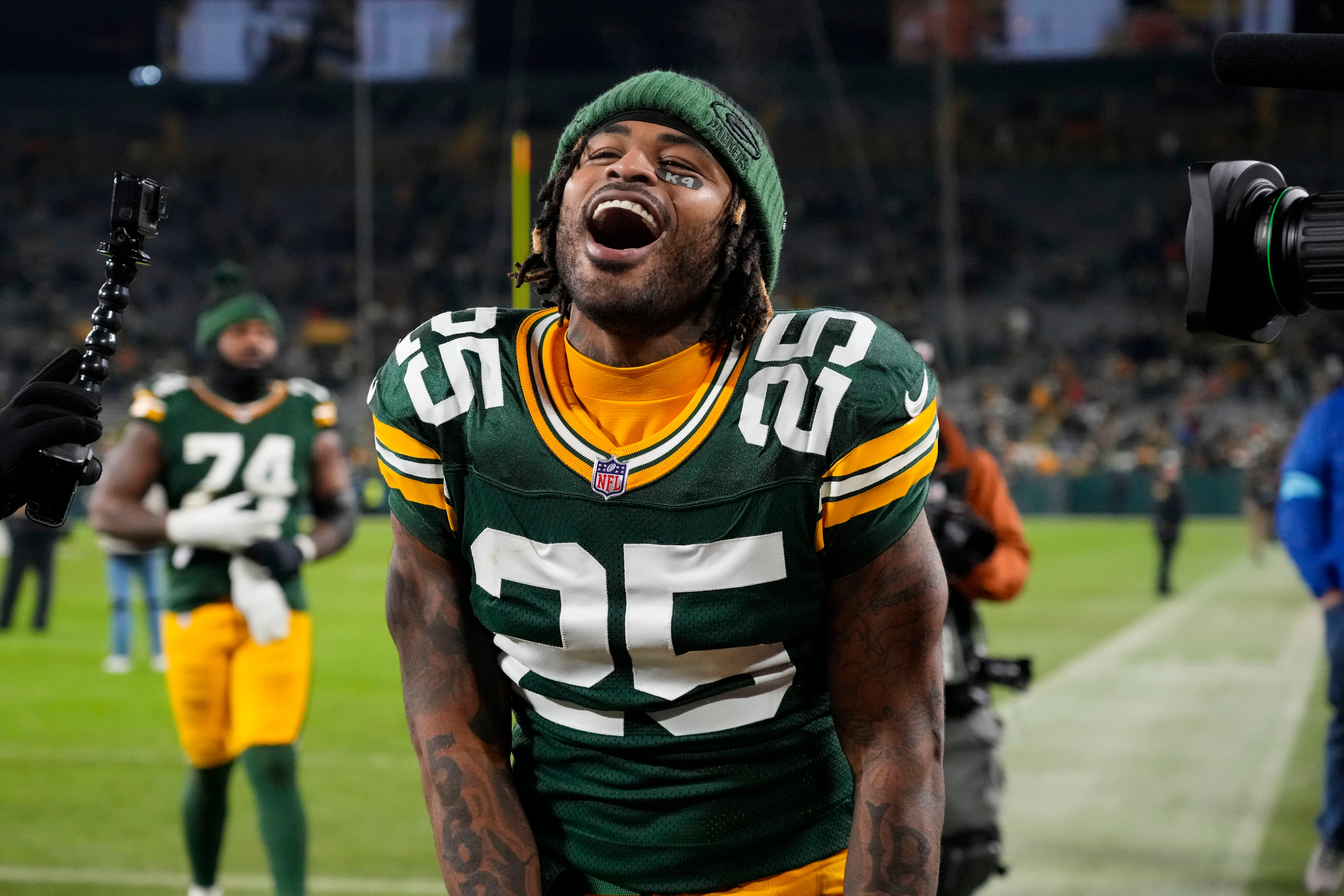 Green Bay Packers cornerback Keisean Nixon (25) celebrates before leaving the field following the game against the New Orleans Saints at Lambeau Field.