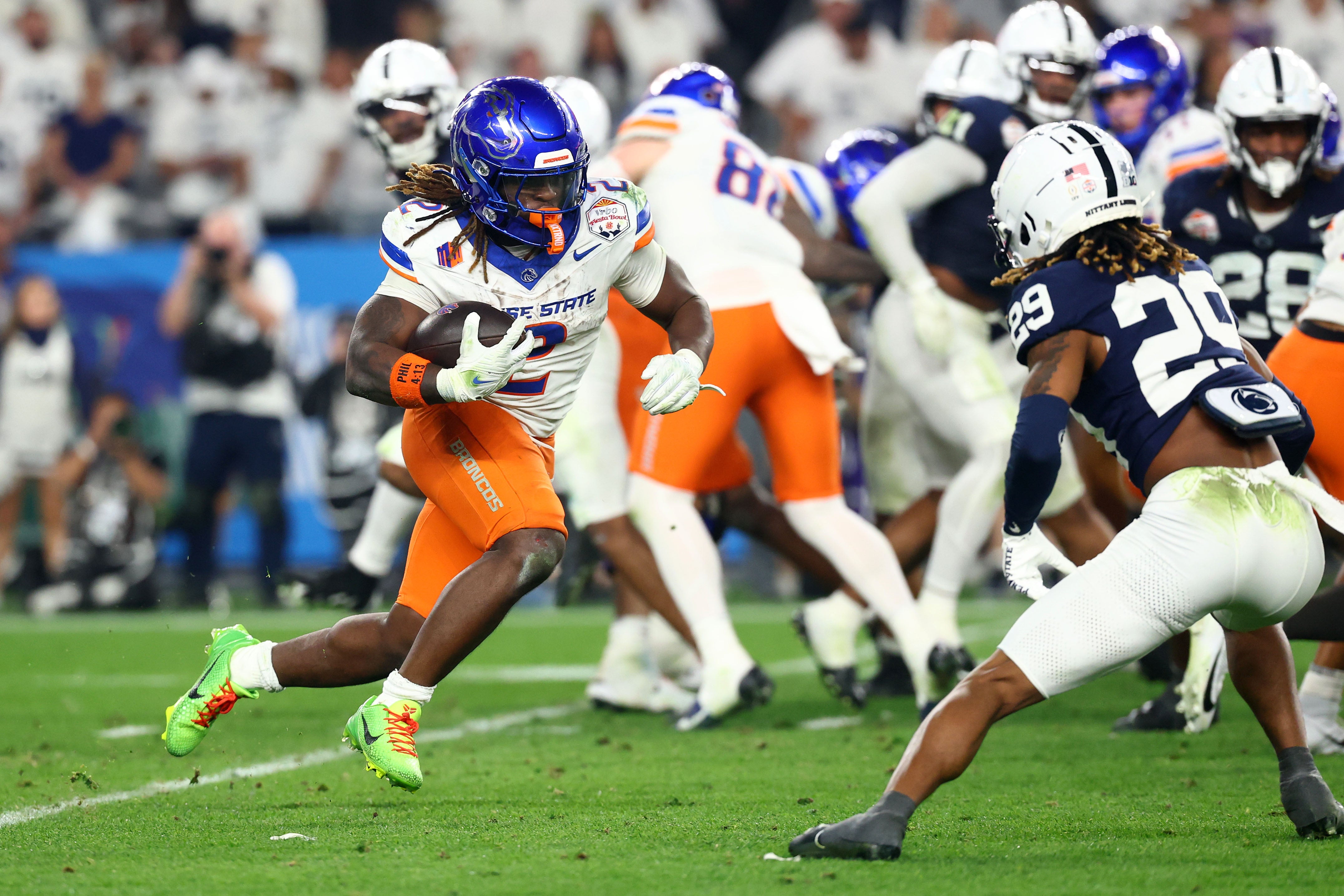 Dec 31, 2024; Glendale, AZ, USA; Boise State Broncos running back Ashton Jeanty (2) rushes the ball against the Penn State Nittany Lions during the second half in the Fiesta Bowl at State Farm Stadium.
