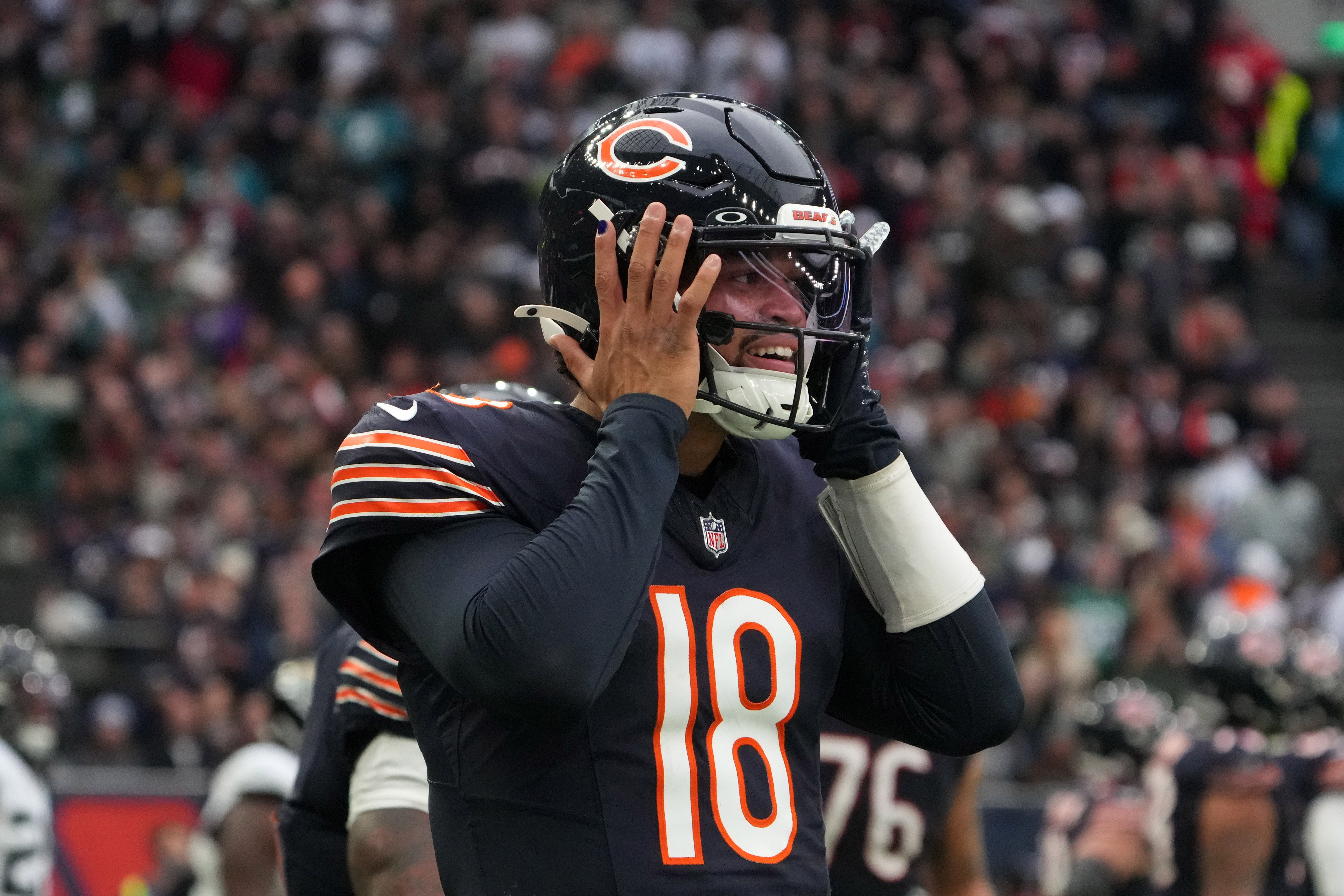 Oct 13, 2024; London, United Kingdom; Chicago Bears quarterback Caleb Williams (18) celebrates after a touchdown against the Jacksonville Jaguars in the second half during an NFL International Series game at Tottenham Hotspur Stadium.
