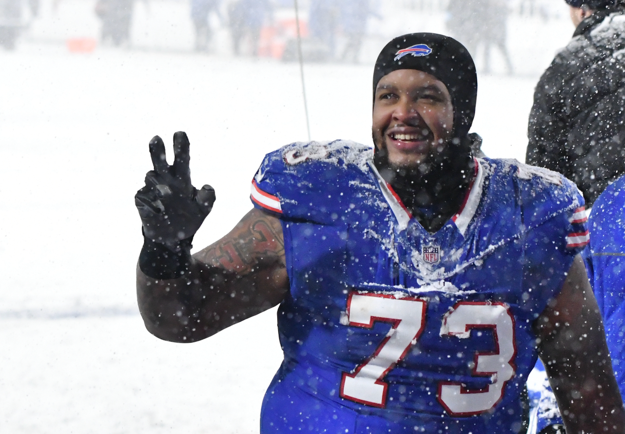 Dec 1, 2024; Orchard Park, New York, USA; Buffalo Bills offensive tackle Dion Dawkins (73) leaves the field after winning a game against the San Francisco 49ers to clinch the AFC East title at Highmark Stadium.