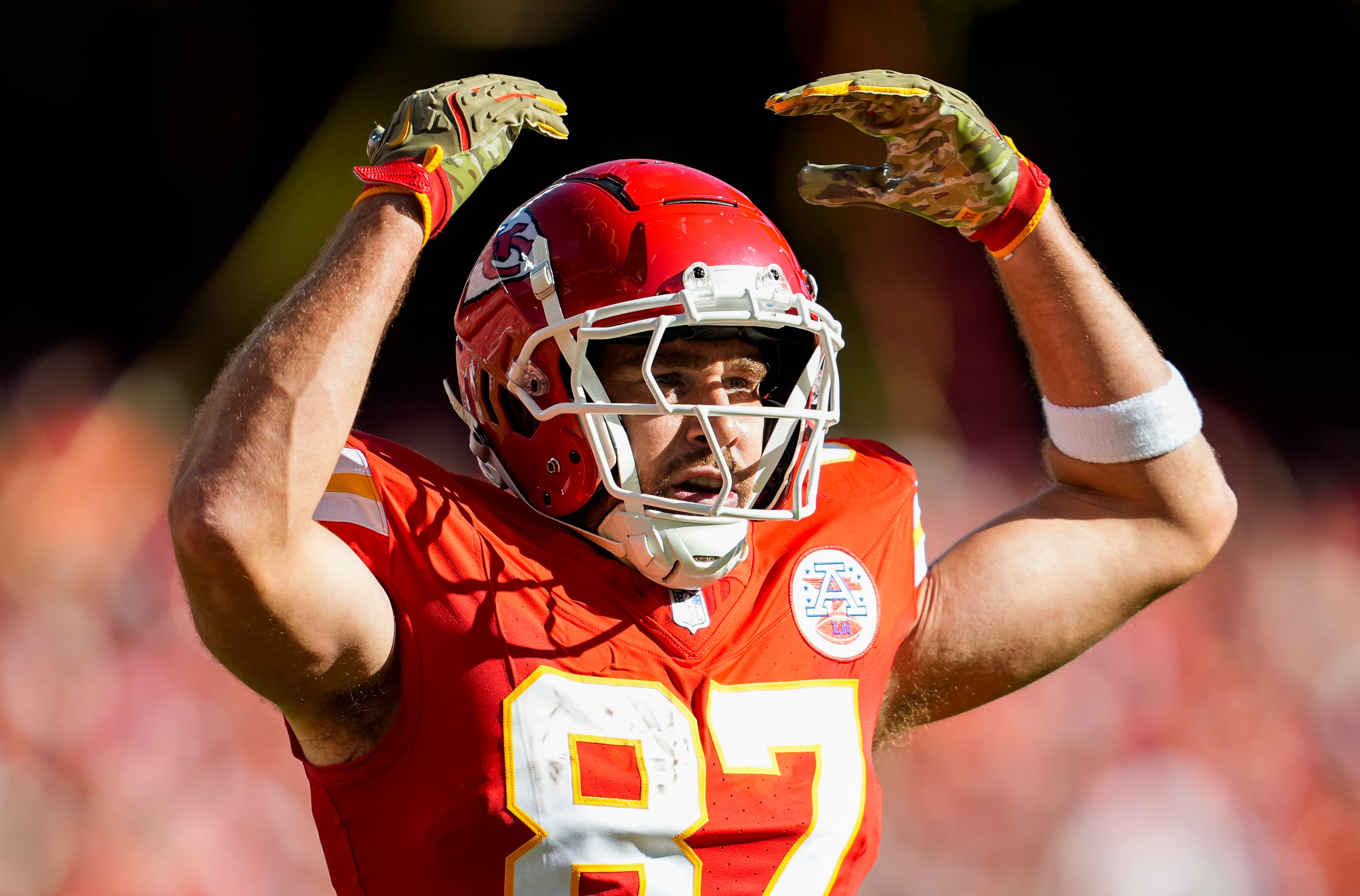 Chiefs tight end Travis Kelce (87) celebrates after scoring a touchdown during the second half against the Broncos.