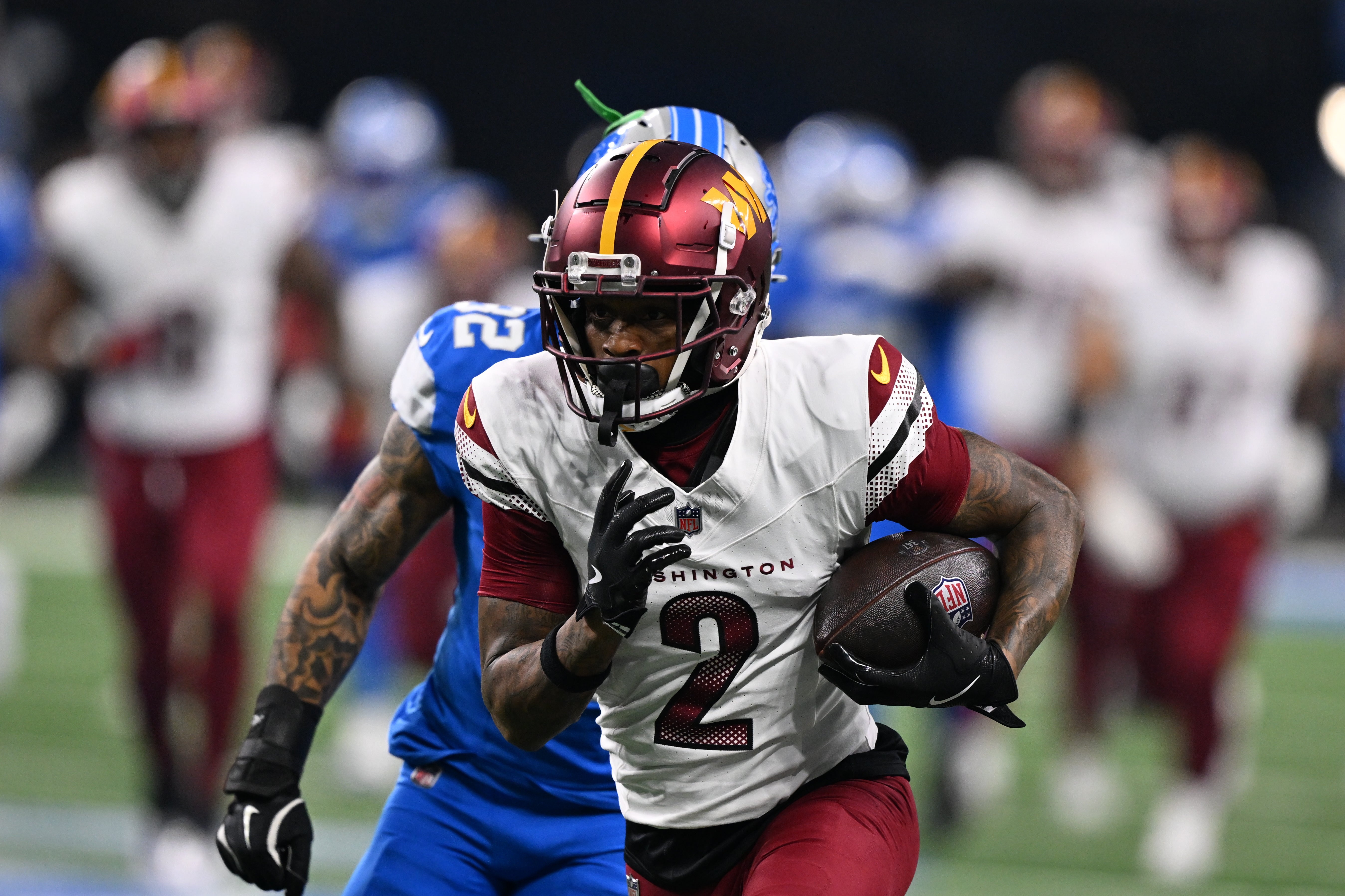 Jan 18, 2025; Detroit, Michigan, USA; Washington Commanders wide receiver Dyami Brown (2) runs the ball during the first quarter against Detroit Lions in a 2025 NFC divisional round game at Ford Field.
