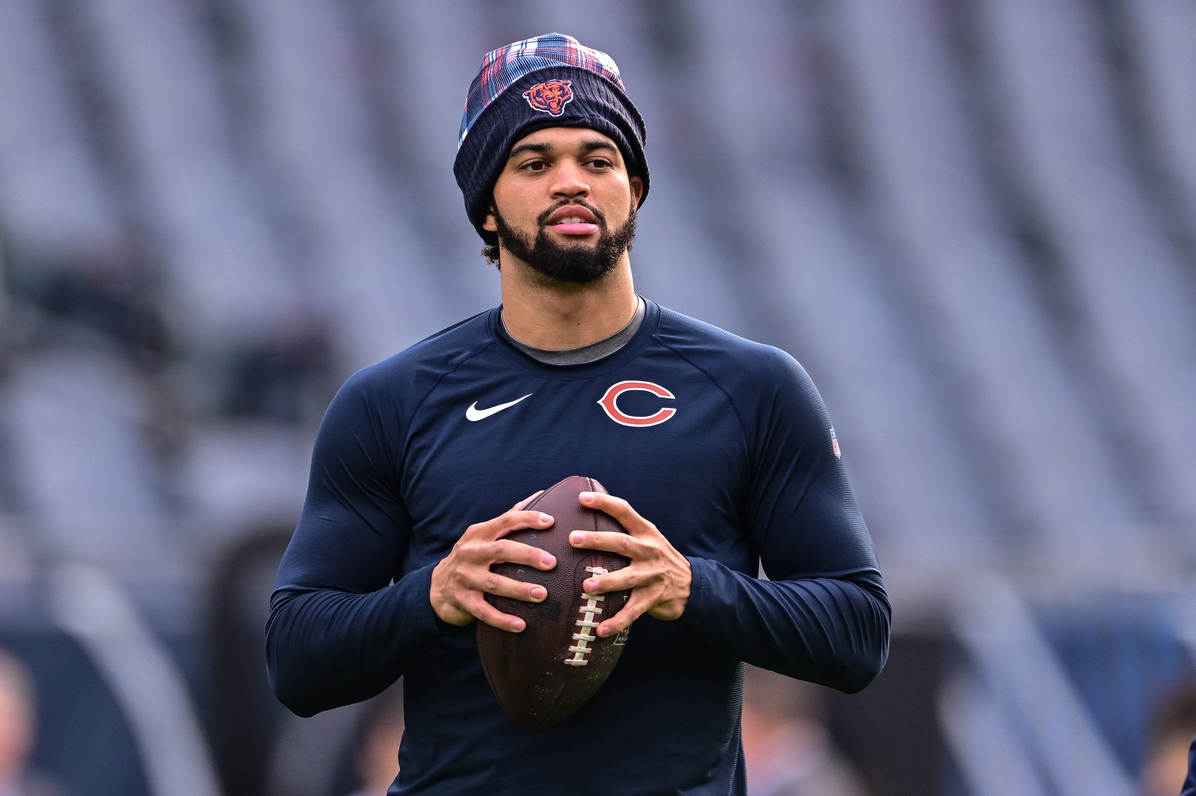 Nov 17, 2024; Chicago, Illinois, USA; Chicago Bears quarterback Caleb Williams (18) warms up before the game against the Green Bay Packers at Soldier Field.