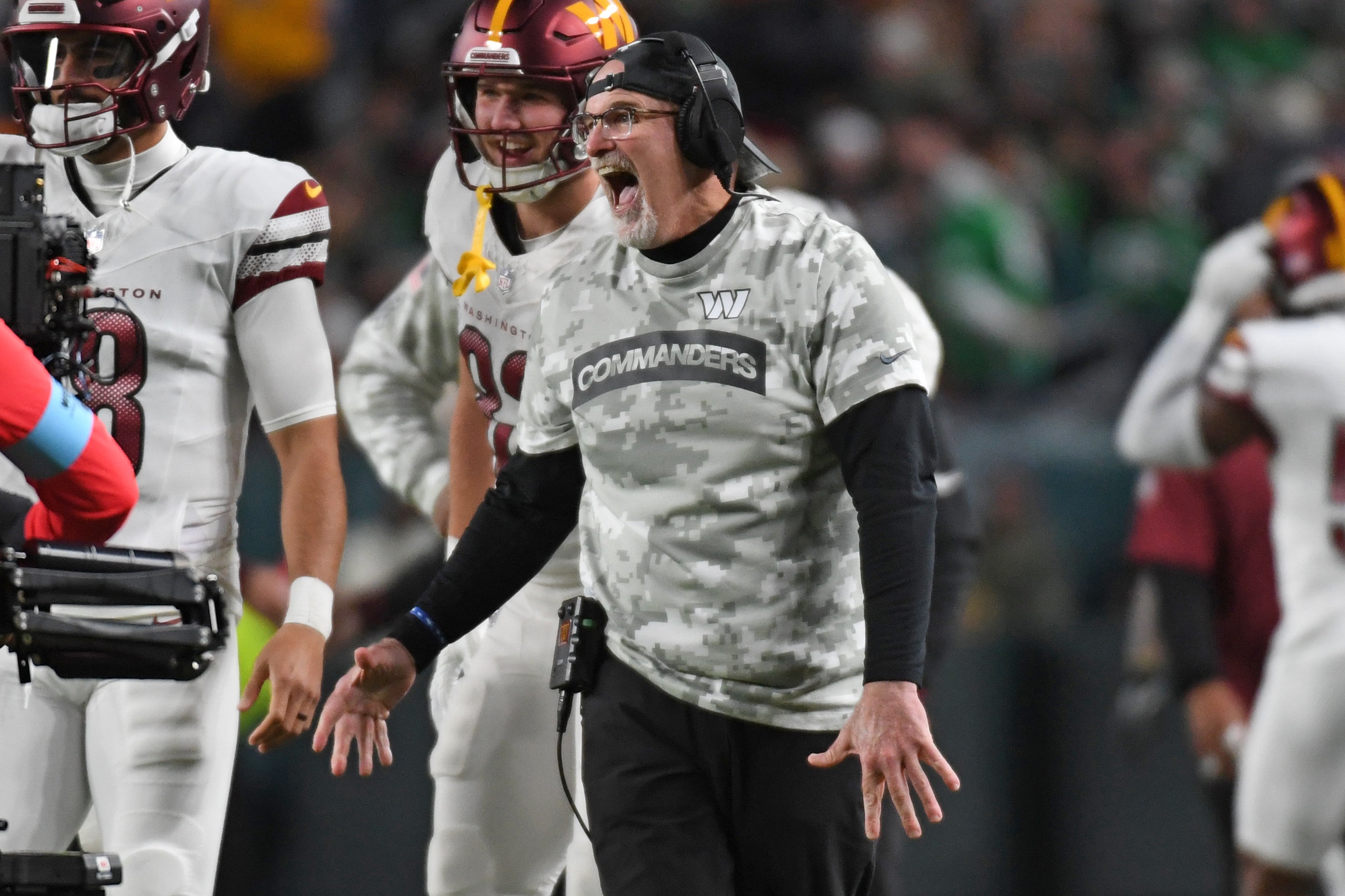 Nov 14, 2024; Philadelphia, Pennsylvania, USA; Washington Commanders head coach Dan Quinn reacts after a touchdown against the Philadelphia Eagles during the first quarter at Lincoln Financial Field.