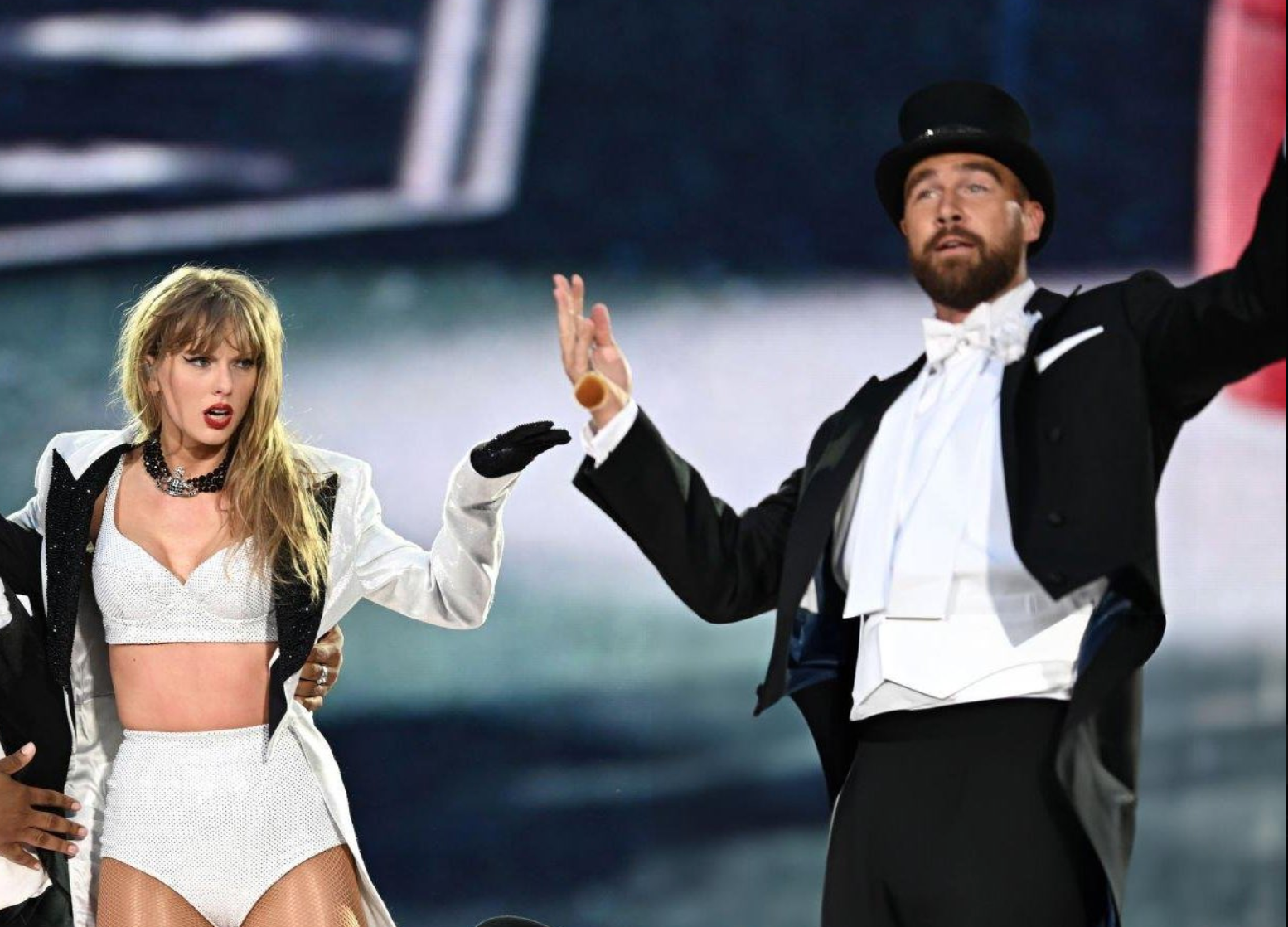 Taylor Swift is joined by Travis Kelce on stage during her third Eras Tour show at Wembley Stadium on Sunday, June 23, 2024