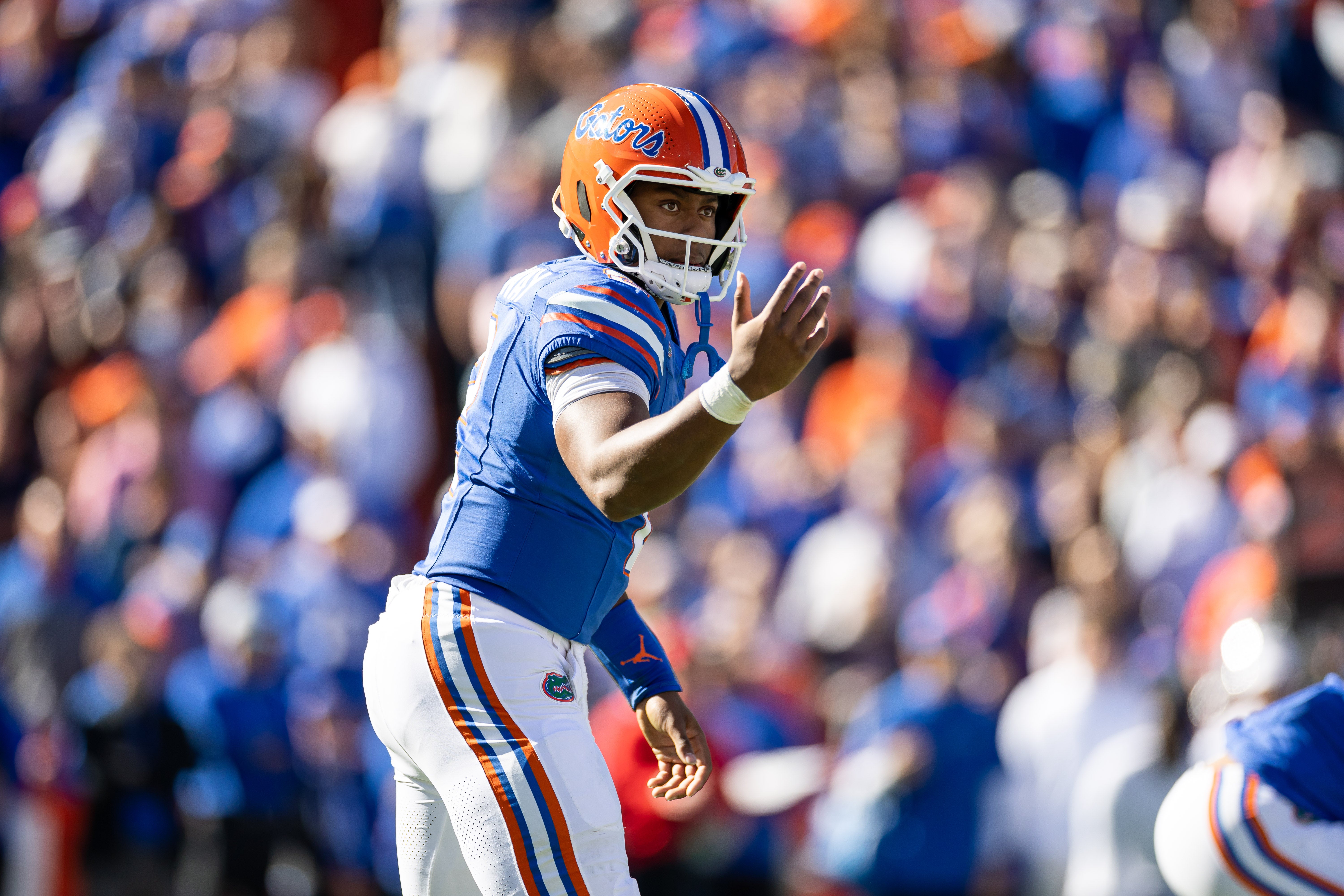 Nov 23, 2024; Gainesville, Florida, USA; Florida Gators quarterback DJ Lagway (2) gestures before the snap against the Mississippi Rebels during the first half at Ben Hill Griffin Stadium.