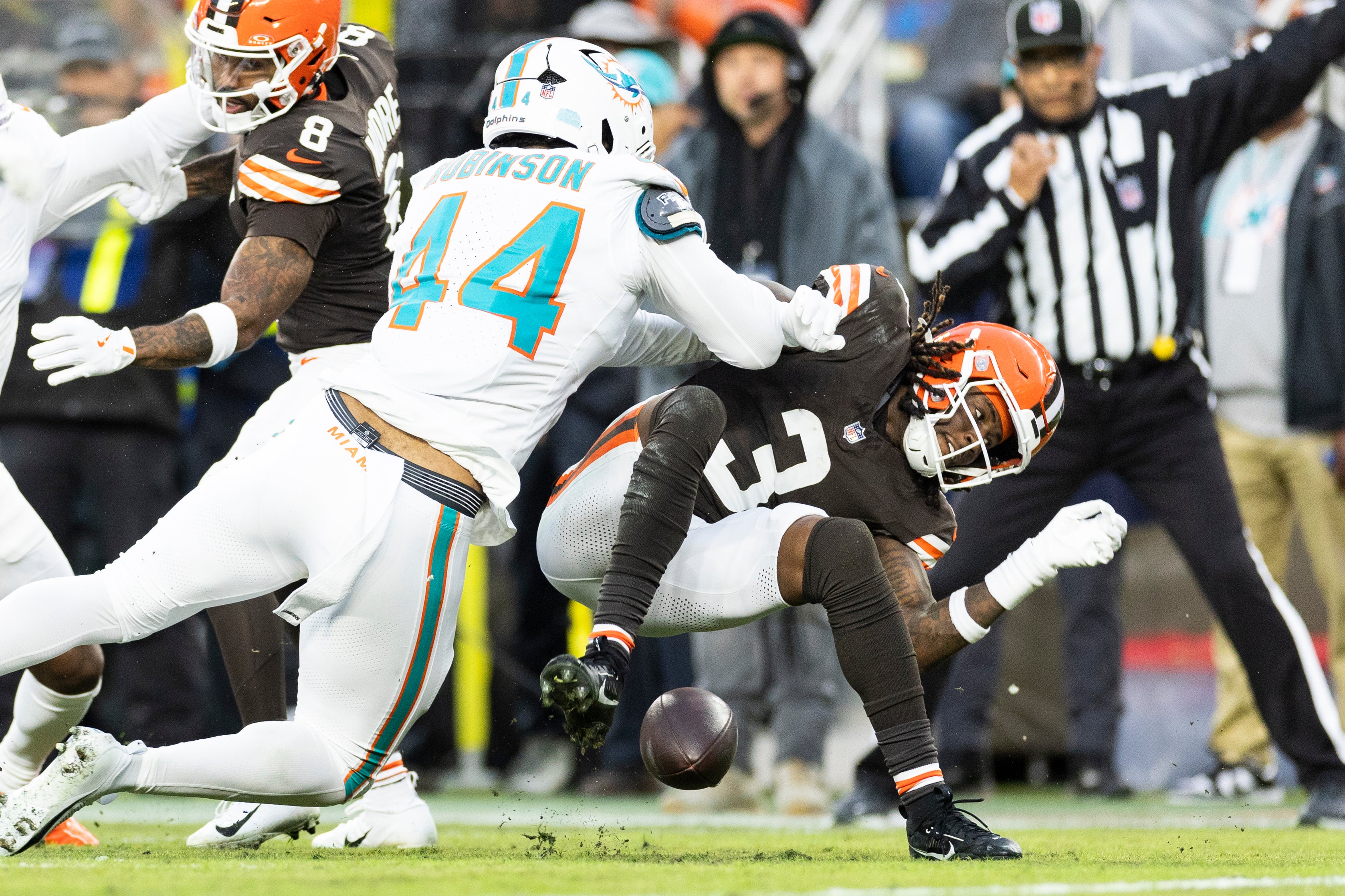 Dec 29, 2024; Cleveland, Ohio, USA; Miami Dolphins linebacker Chop Robinson (44) hits Cleveland Browns wide receiver Jerry Jeudy (3) breaking up the pass during the second quarter at Huntington Bank Field