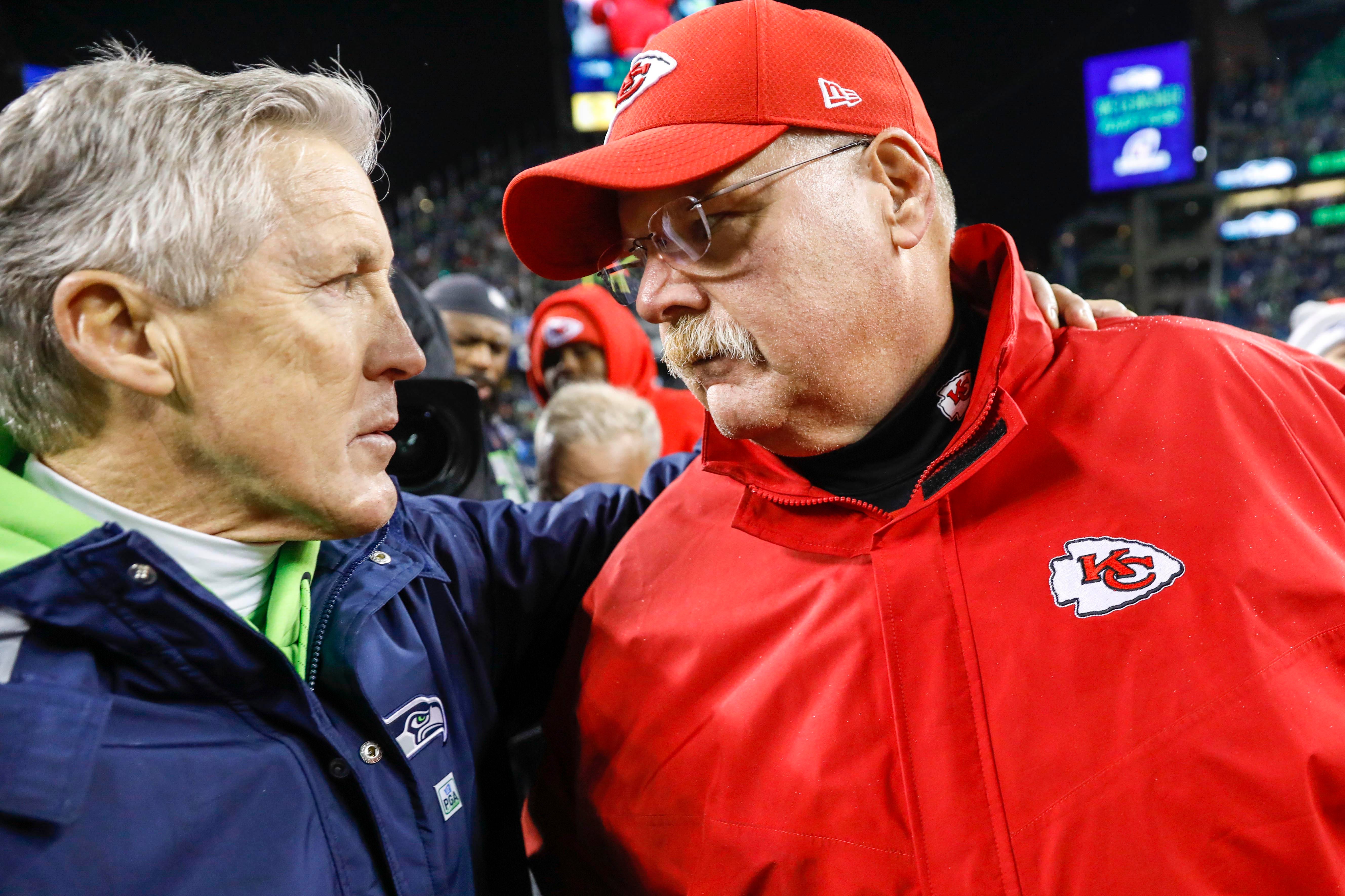 Dec 23, 2018; Seattle, WA, USA; Seattle Seahawks head coach Pete Carroll greets Kansas City Chiefs head coach Andy Reid following a 38-31 Seattle victory at CenturyLink Field.