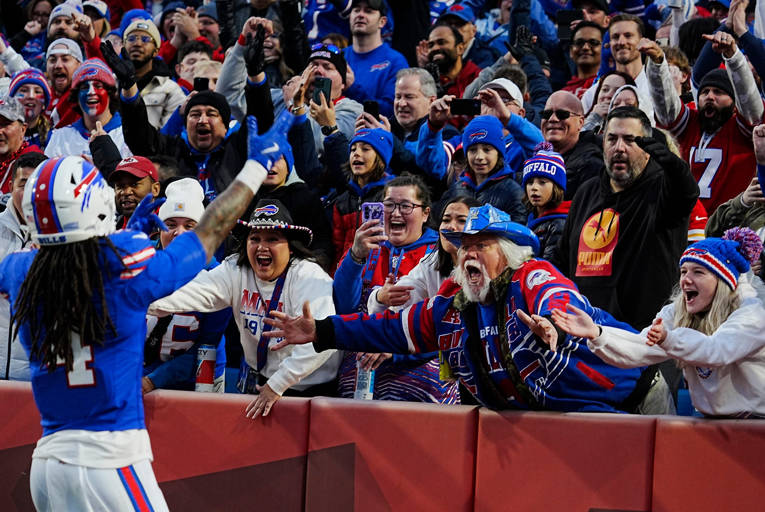 Bills James Cook after scoring a touchdown runs towards the fans to celebrate it during first half action against the Kansas City Chiefs in Orchard Park, Nov.17, 2024.