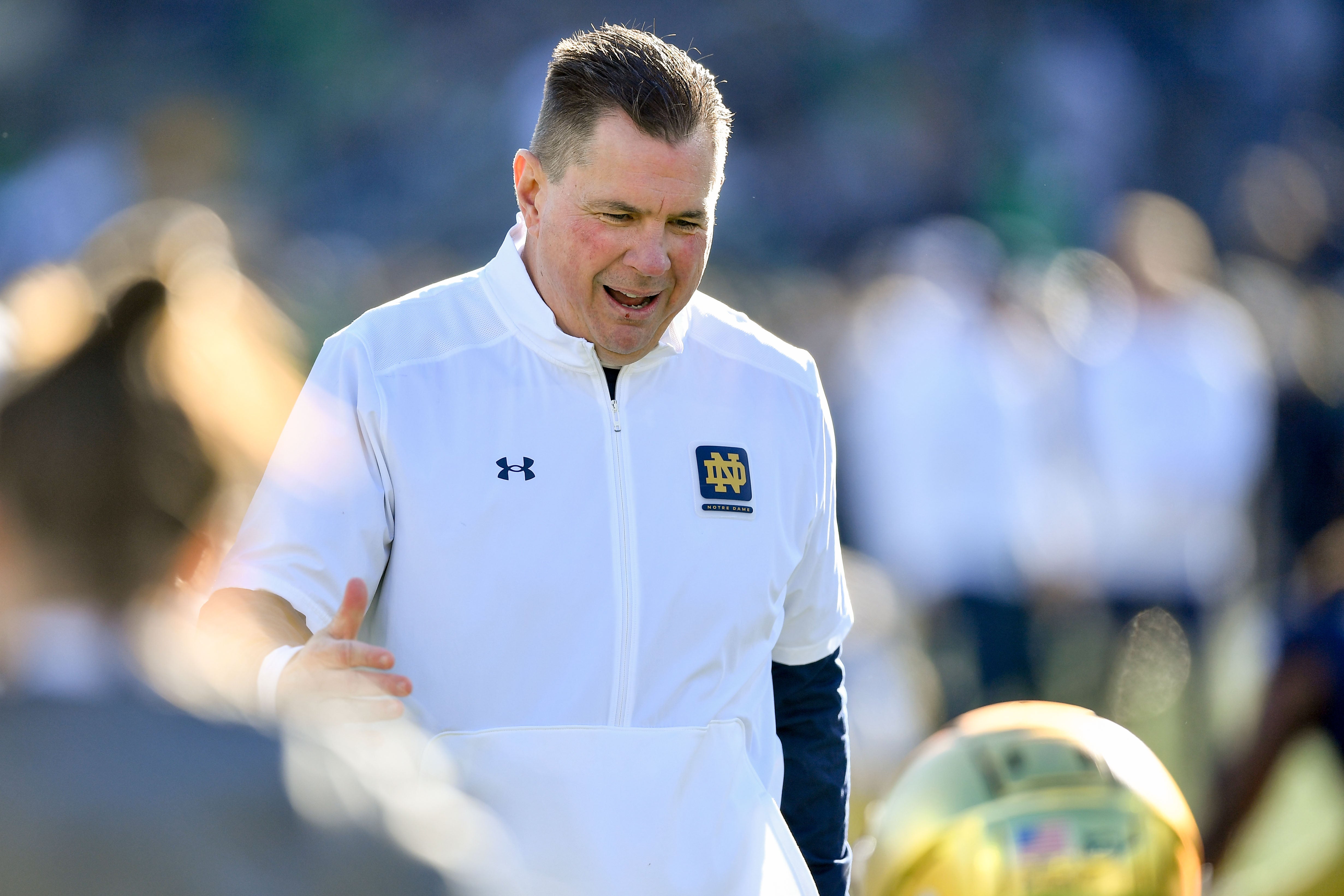 Nov 18, 2023; South Bend, Indiana, USA; Notre Dame Fighting Irish defensive coordinator Al Golden talks to players during warmups before the game against the Wake Forest Demon Deacons at Notre Dame Stadium.