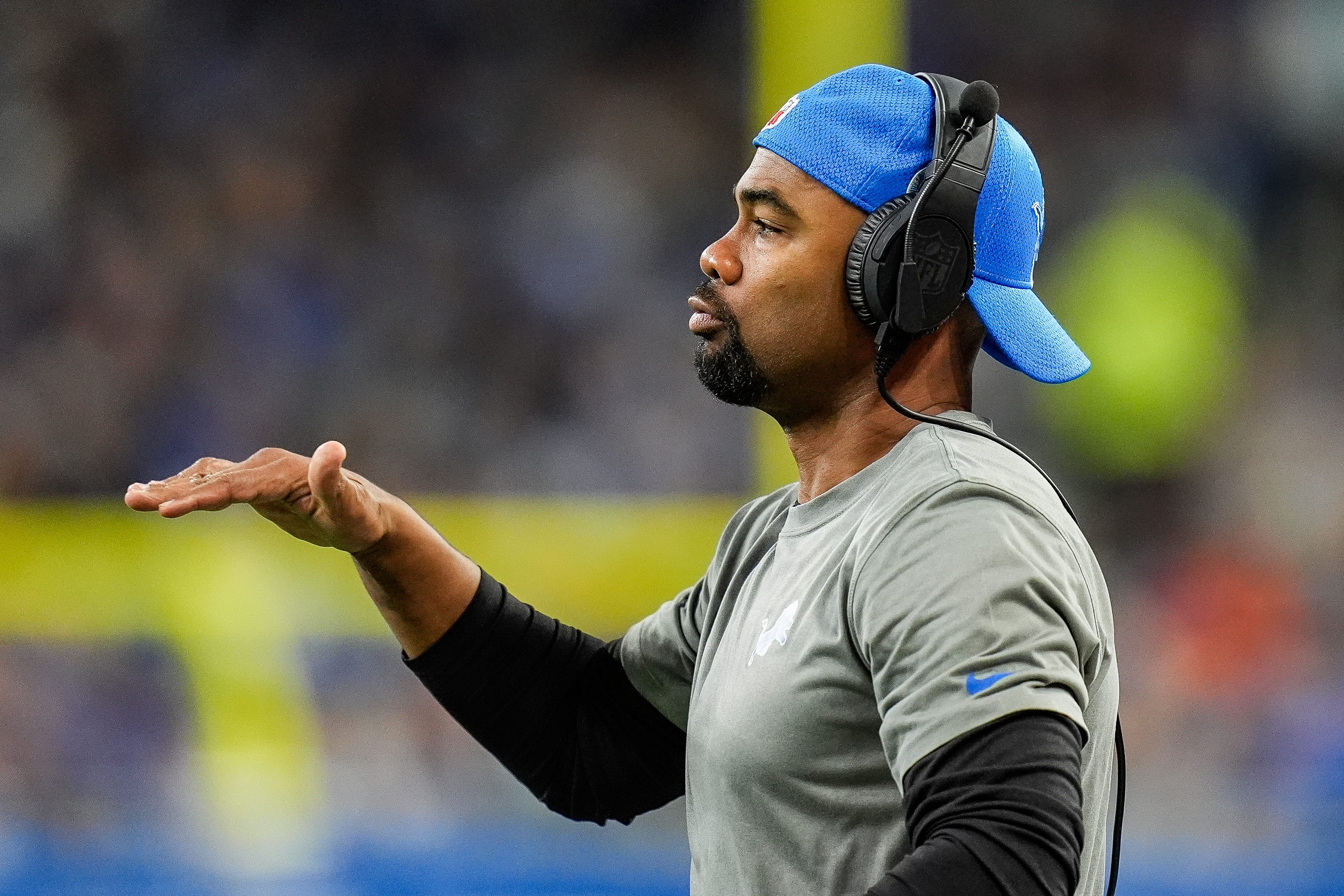 Detroit Lions wide receivers coach Antwaan Randle El communicates with players during the second half against Tennessee Titans at Ford Field in Detroit.