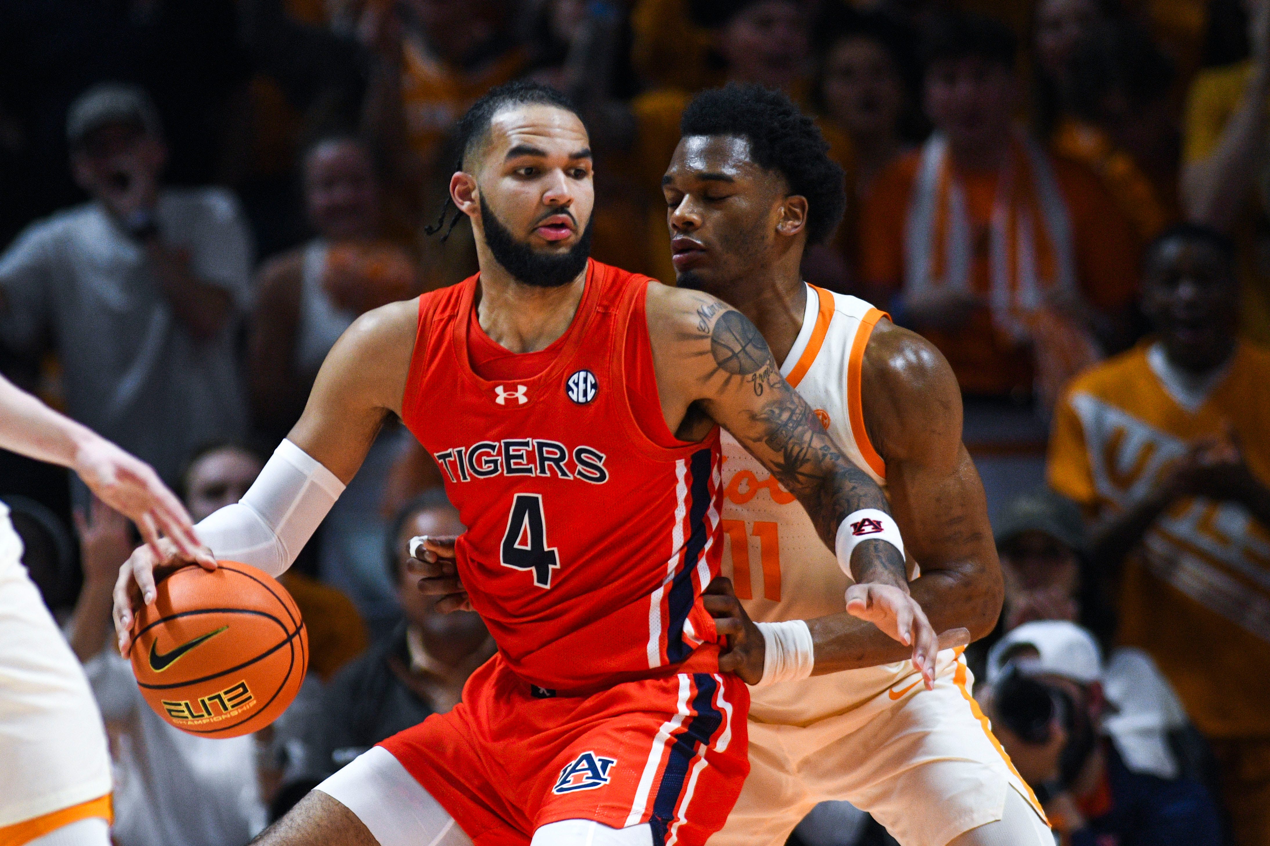 Tennessee forward Tobe Awaka (11) guards Auburn Johni Broome (4) during a NCAA game at Thompson-Boling Arena at Food City Center in Knoxville, Wednesday, Feb. 28, 2024. Tennessee won 92-84 against Auburn.