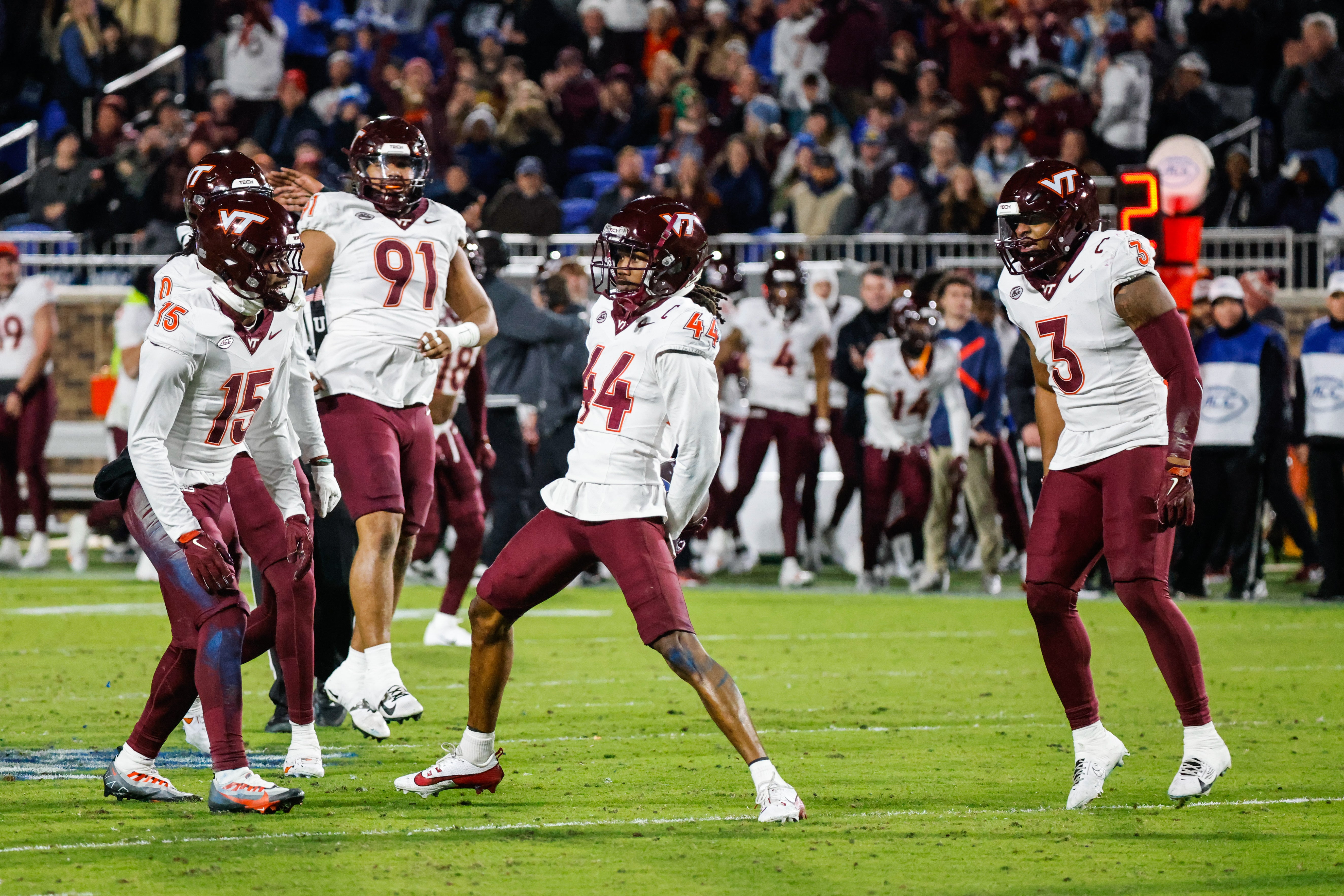 Virginia Tech Hokies cornerback Dorian Strong (44) celebrates an interception with teammates during the second half of the game against Duke Blue Devils at Wallace Wade Stadium.