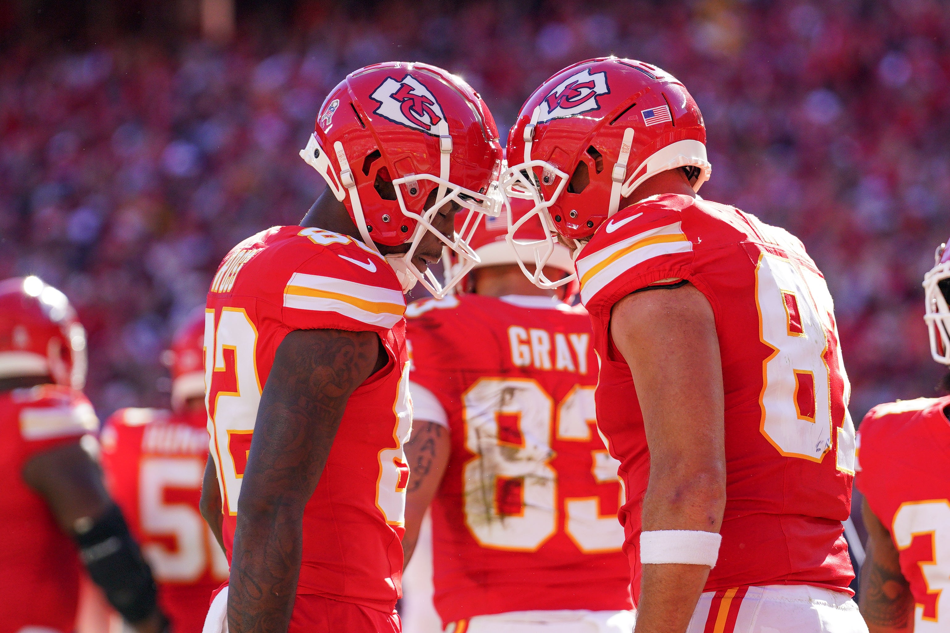 Nov 10, 2024; Kansas City, Missouri, USA; Kansas City Chiefs tight end Travis Kelce (87) celebrates with wide receiver Justyn Ross (82) after scoring against the Denver Broncos during the game at GEHA Field at Arrowhead Stadium.