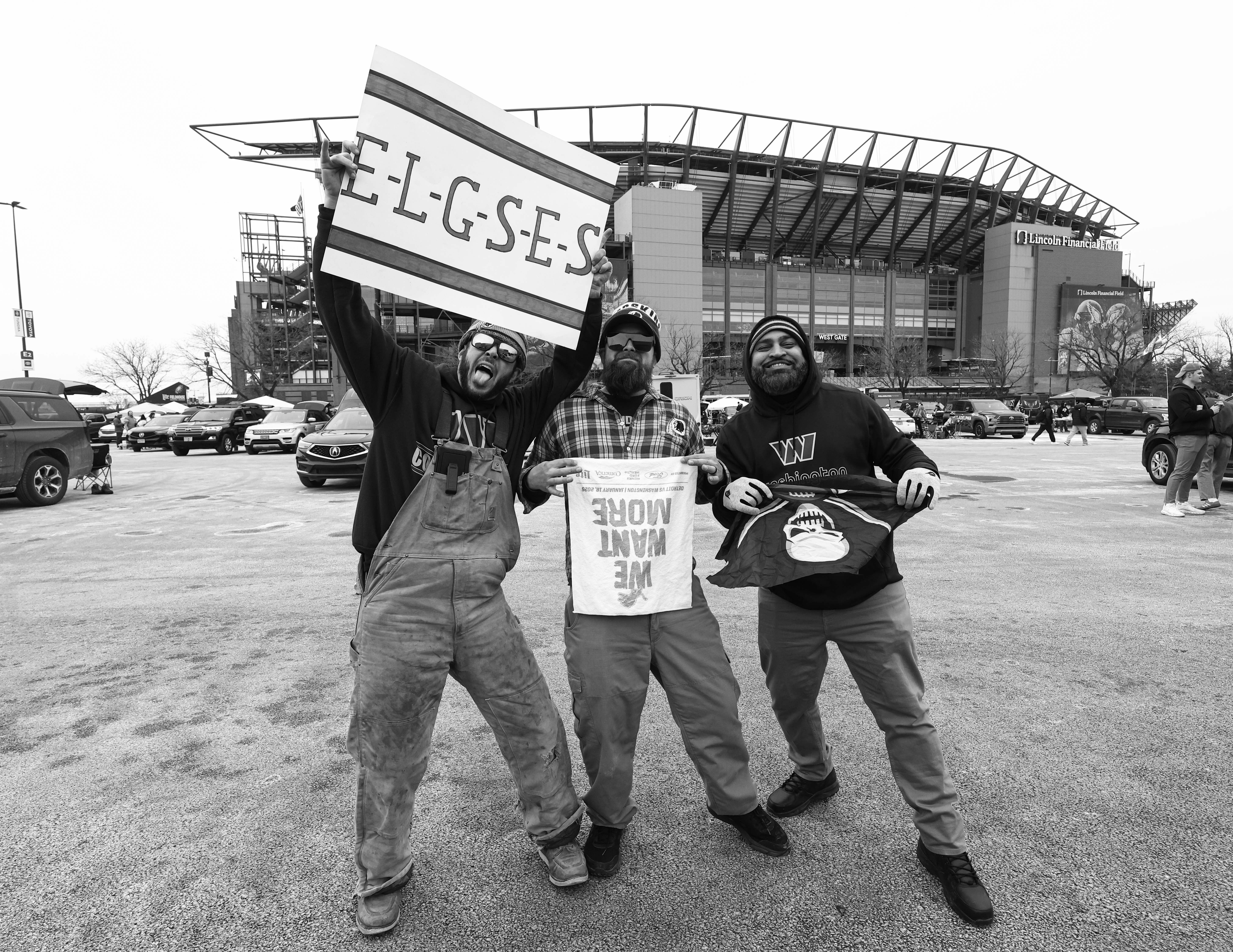 Jan 26, 2025; Philadelphia, PA, USA; (Black and White image created in camera) Washington Commanders fans outside Lincoln Financial Field before the NFC Championship game against the Philadelphia Eagles