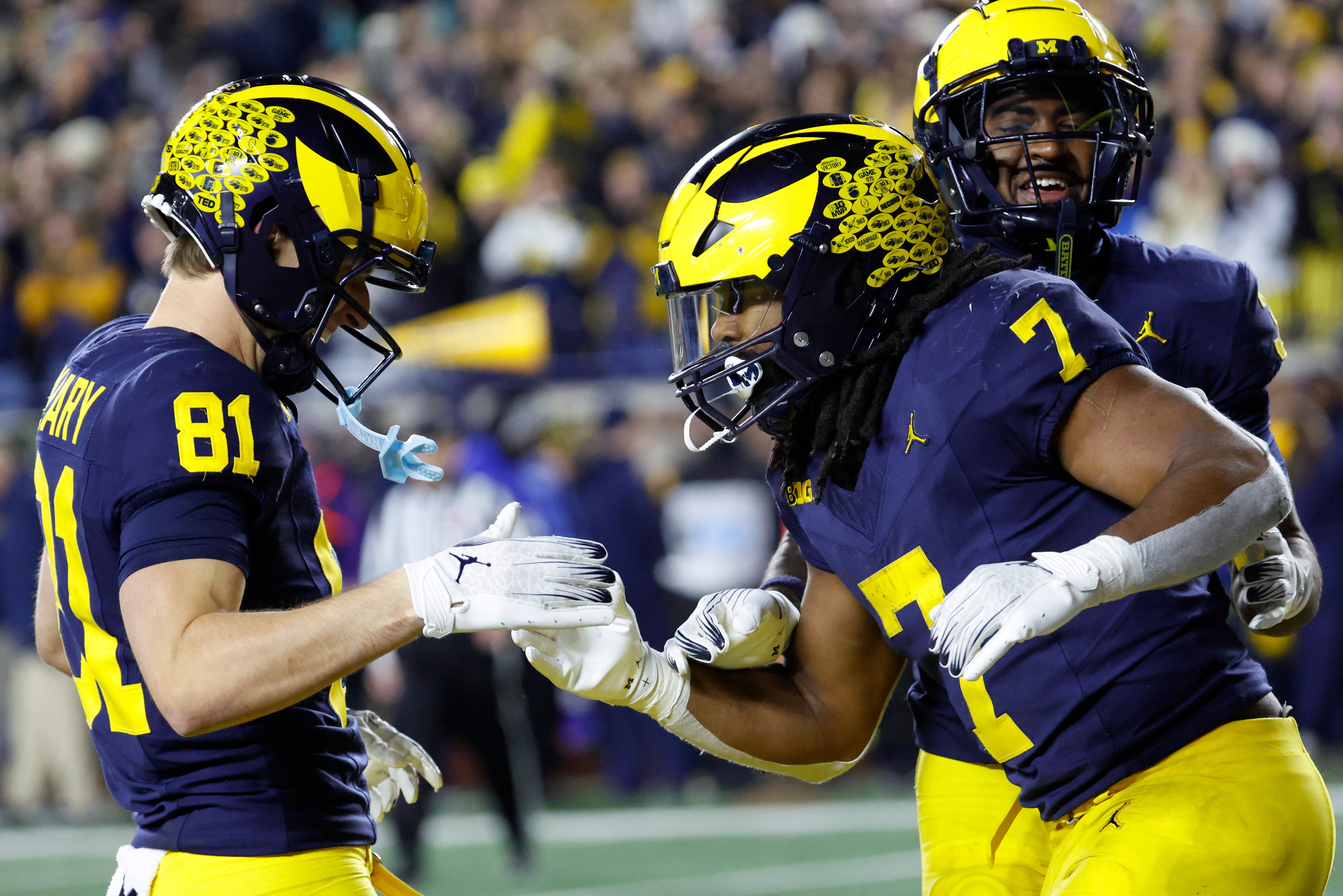 Donovan Edwards, RB Michigan celebrates with Wolverines teammates