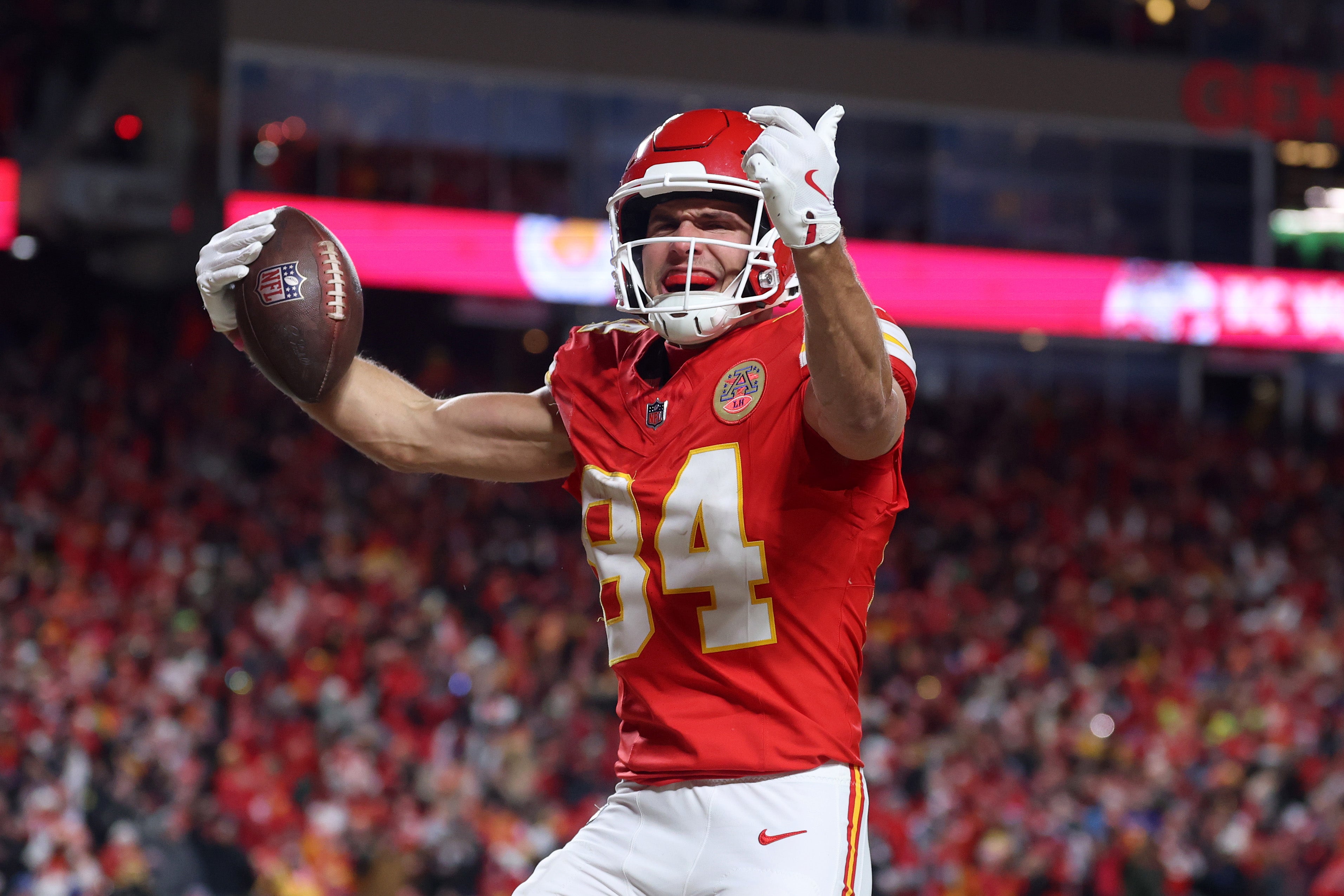 Jan 26, 2025; Kansas City, MO, USA; Kansas City Chiefs wide receiver Justin Watson (84) reacts after making a catch for a two point conversion against the Buffalo Bills during the second half in the AFC Championship game at GEHA Field at Arrowhead Stadium.