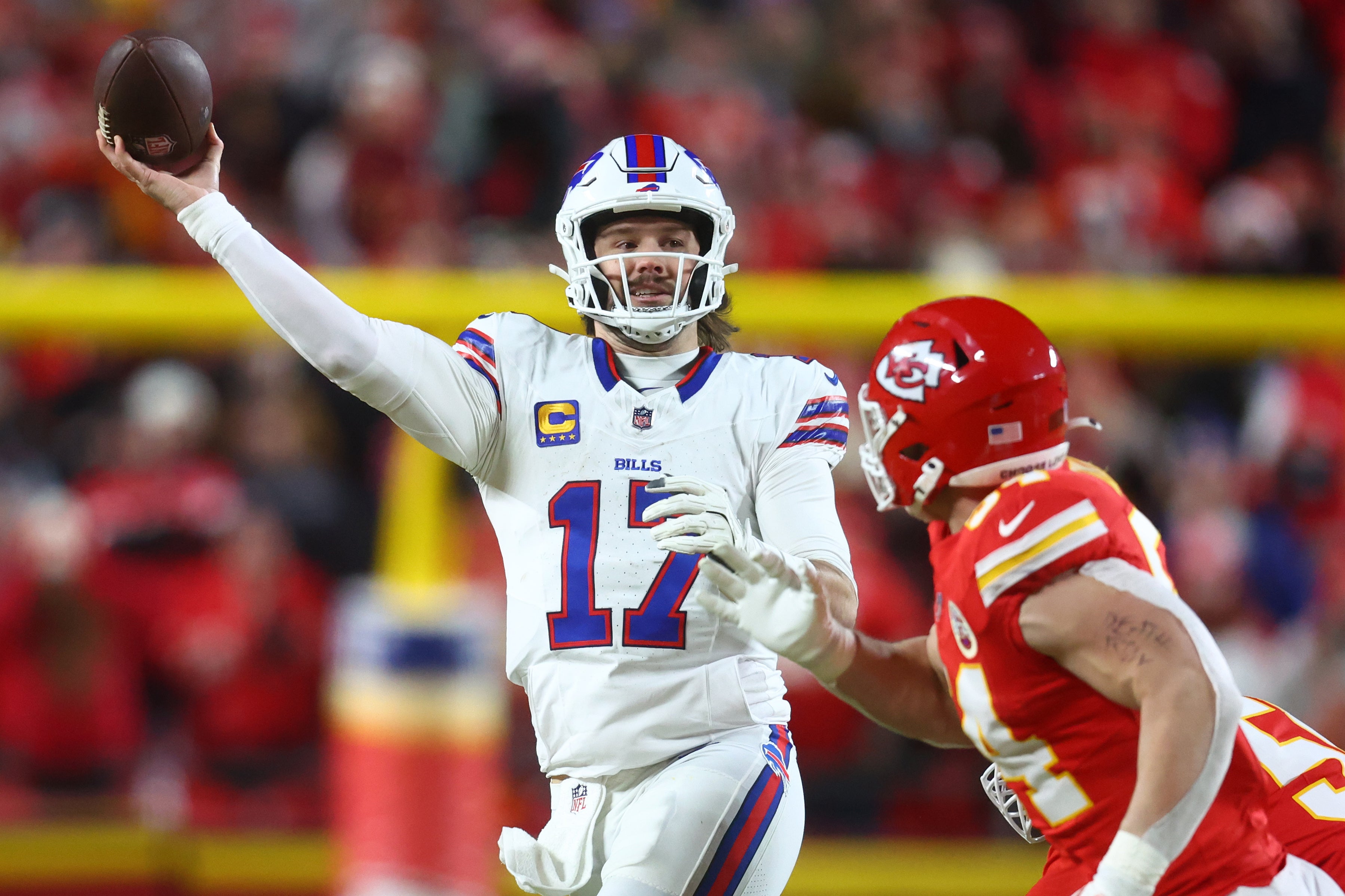 Buffalo Bills quarterback Josh Allen (17) drops back to pass against the Kansas City Chiefs during the first half in the AFC Championship game at GEHA Field at Arrowhead Stadium.