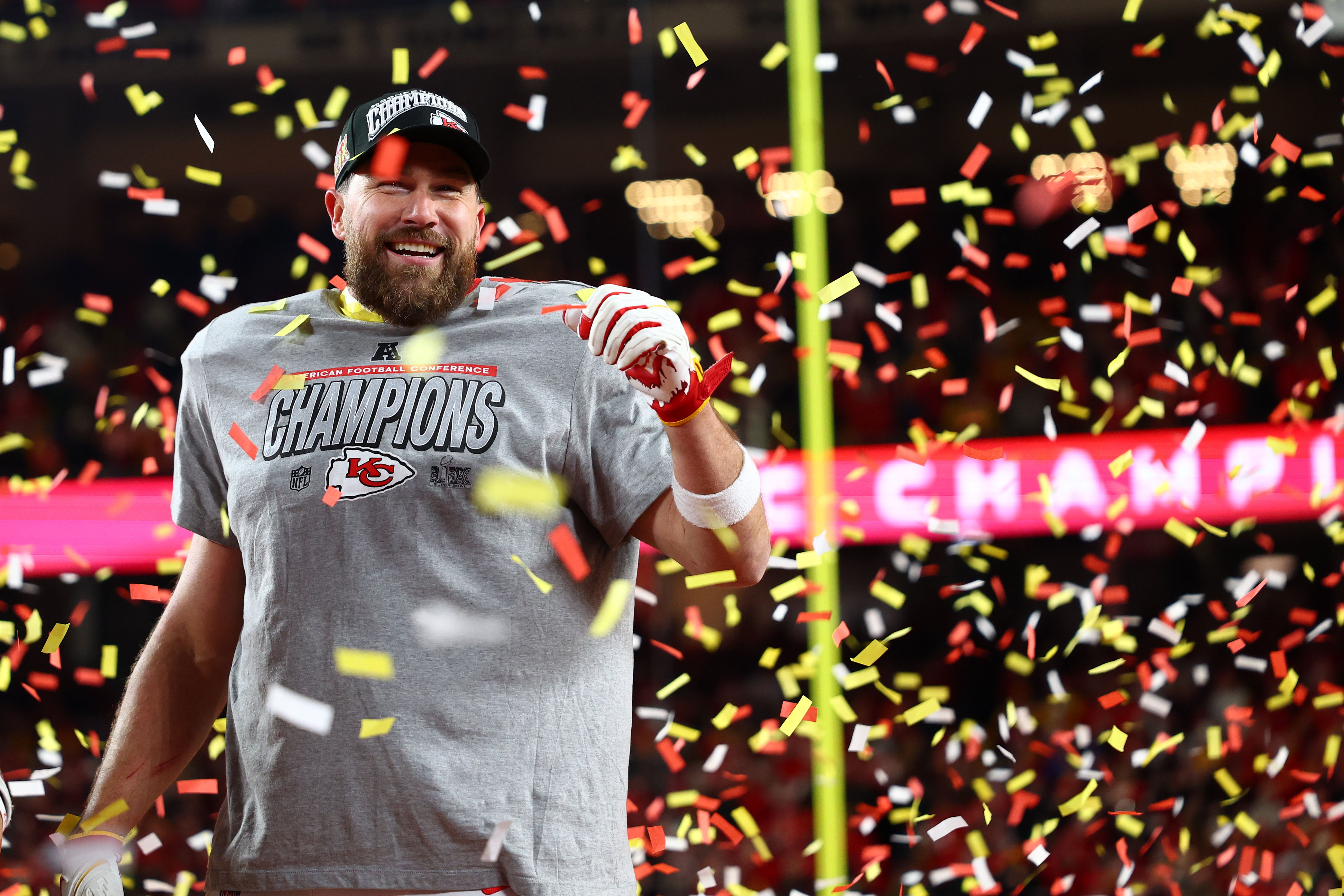 Chiefs tight end Travis Kelce (87) reacts on stage after the AFC Championship game against the Bills.