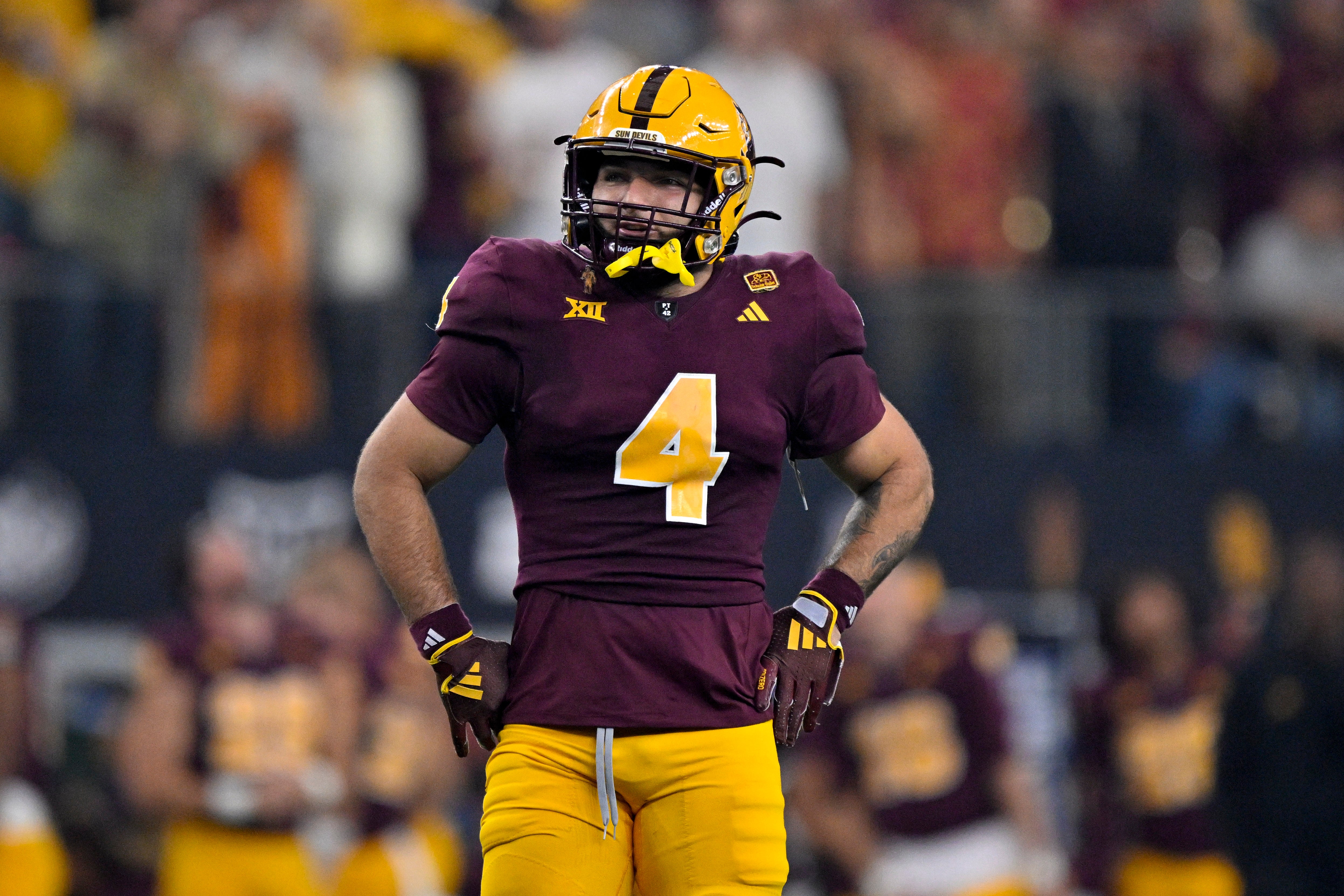 Dec 7, 2024; Arlington, TX, USA; Arizona State Sun Devils running back Cam Skattebo (4) in action during the game between the Iowa State Cyclones and the Arizona State Sun Devils at AT&T Stadium.