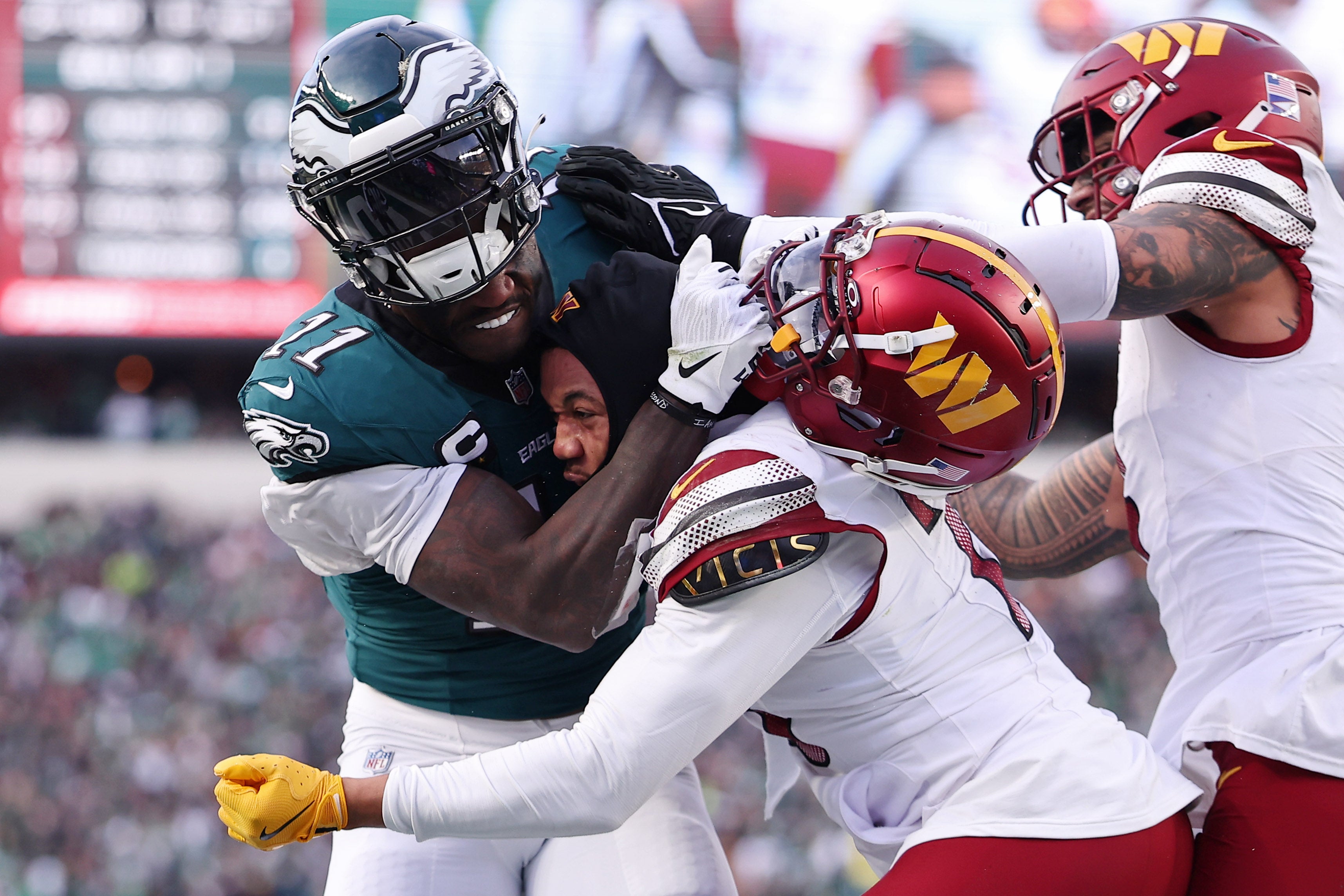 Jan 26, 2025; Philadelphia, PA, USA; Philadelphia Eagles wide receiver A.J. Brown (11) gets into a fight with Washington Commanders cornerback Marshon Lattimore (23) during the first half in the NFC Championship game at Lincoln Financial Field.
