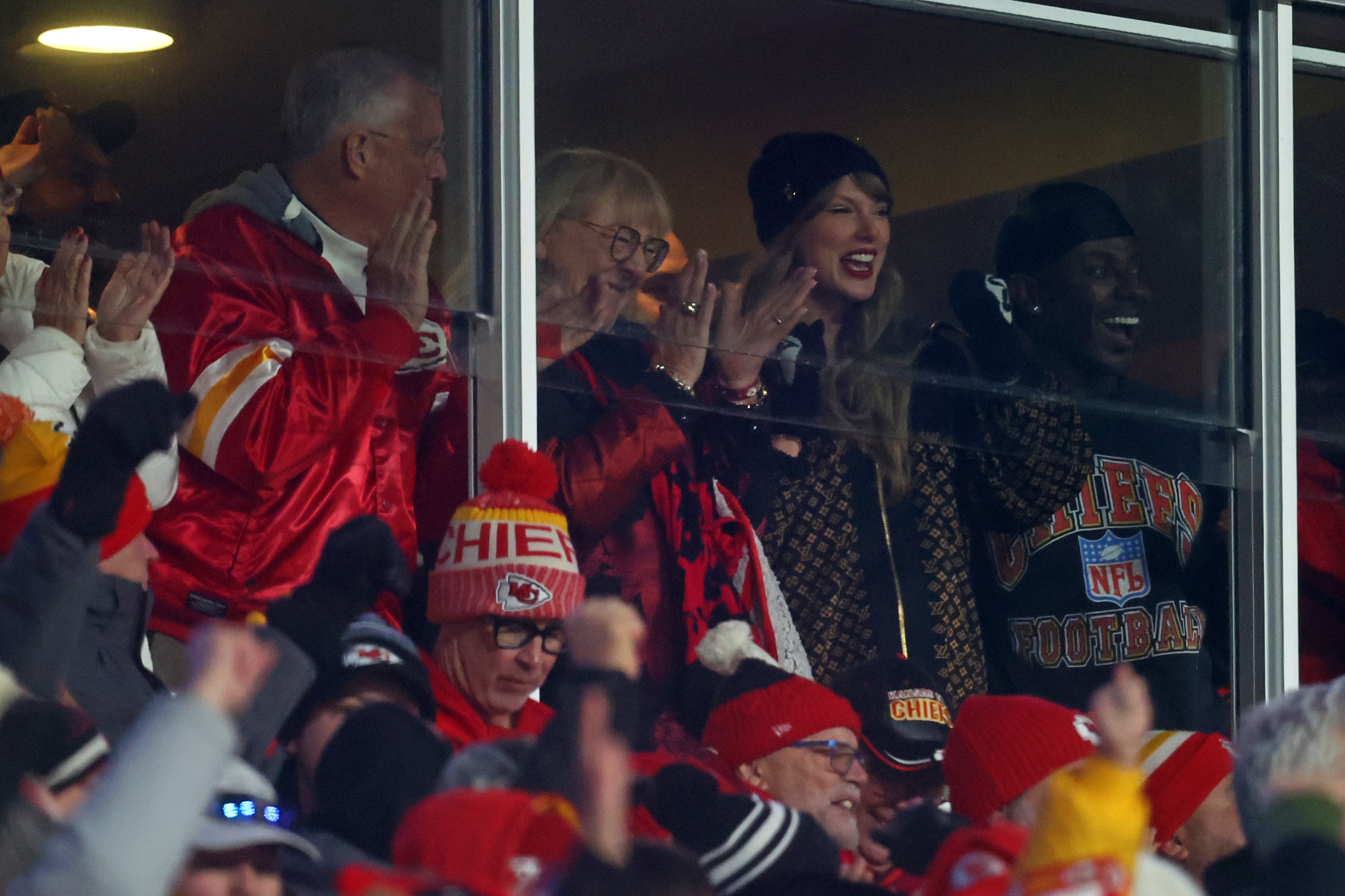 Jan 26, 2025; Kansas City, MO, USA; Recording artist Taylor Swift reacts from the suites in the AFC Championship game at GEHA Field at Arrowhead Stadium.