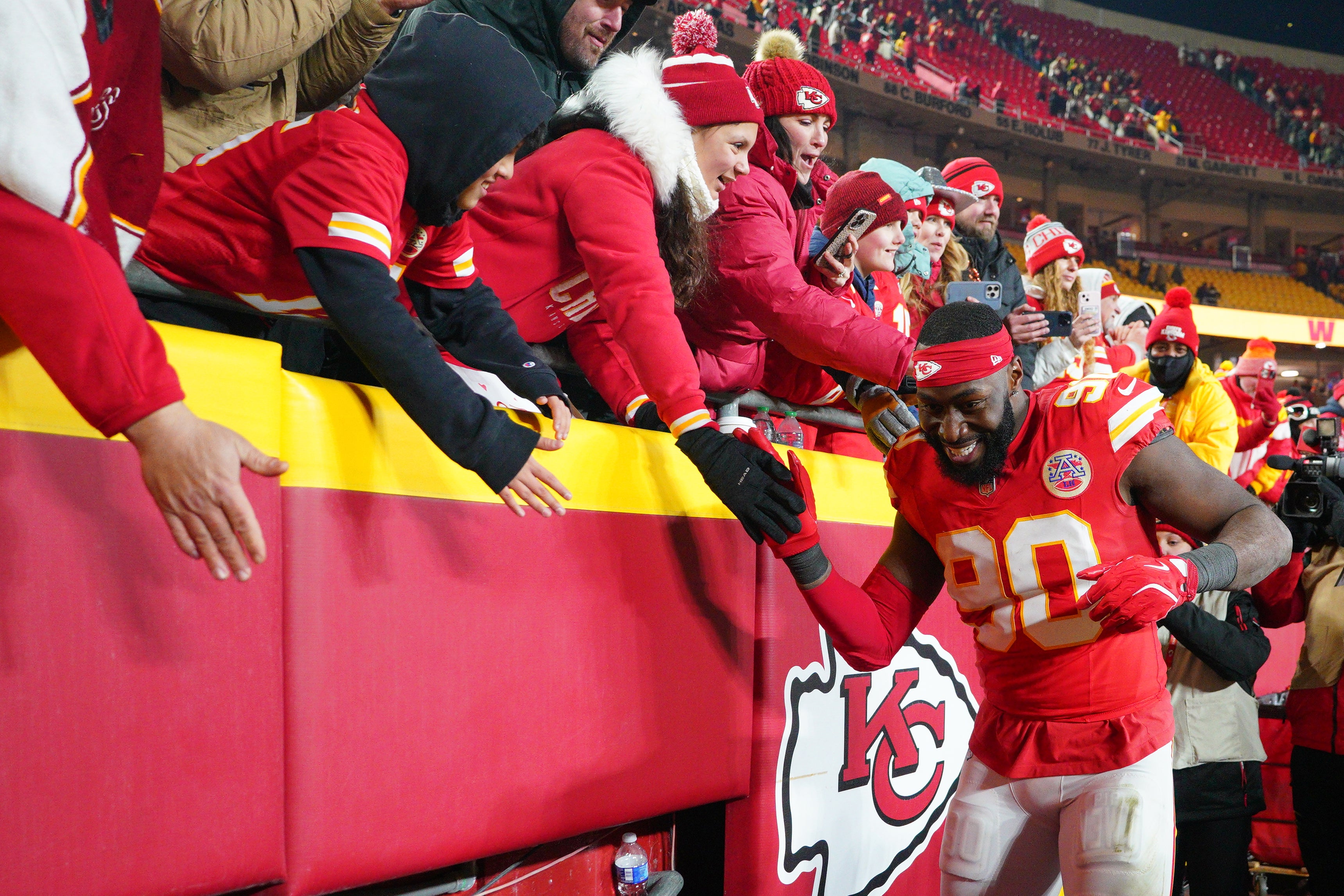 Jan 18, 2025; Kansas City, Missouri, USA; Kansas City Chiefs defensive end Charles Omenihu (90) greets fans while leaving the field after a 2025 AFC divisional round game against the Houston Texans at GEHA Field at Arrowhead Stadium.
