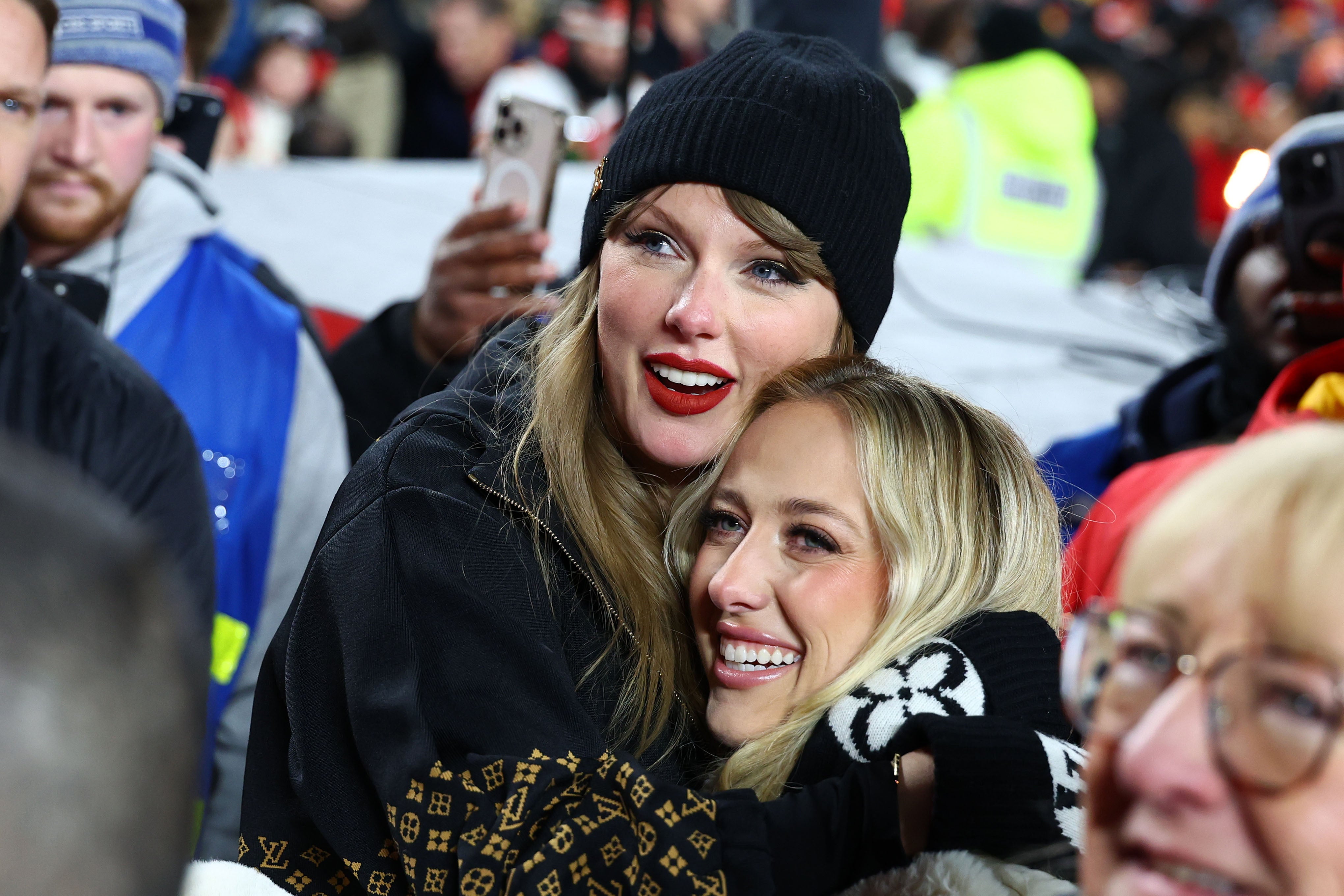 Jan 26, 2025; Kansas City, MO, USA; Recording artist Taylor Swift and Brittany Mahomes react after the AFC Championship game against the Buffalo Bills at GEHA Field at Arrowhead Stadium.