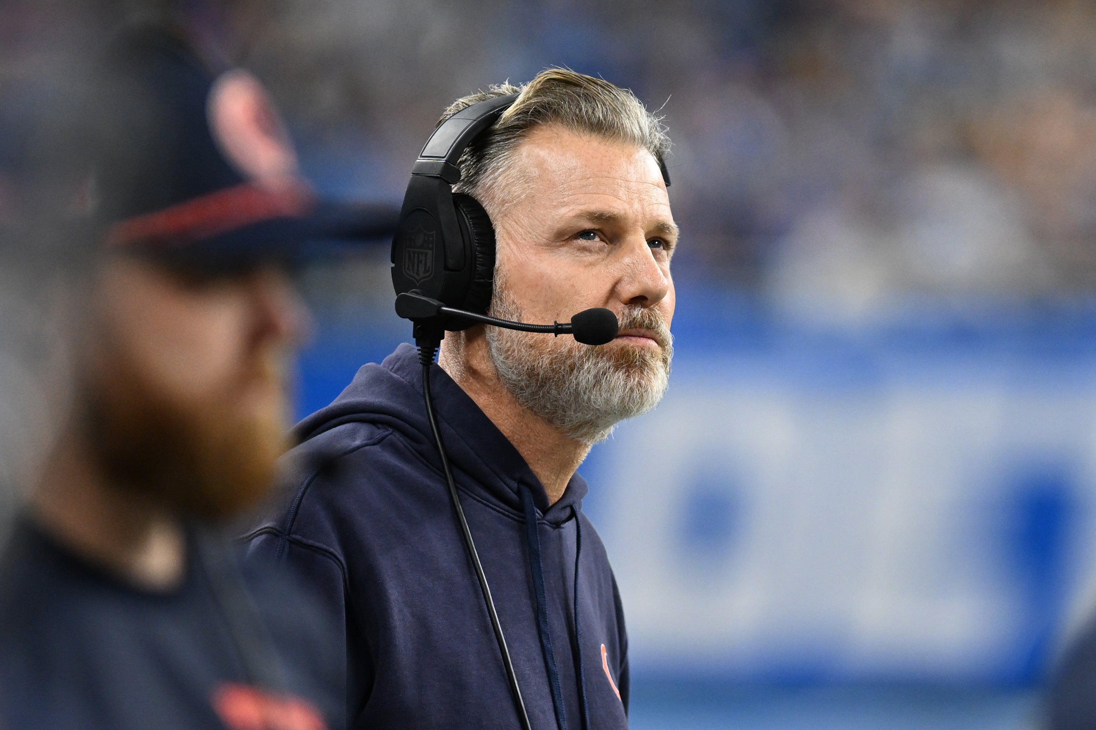 Nov 28, 2024; Detroit, Michigan, USA; Chicago Bears head coach Matt Eberflus looks at the scoreboard during their game against the Detroit Lions in the first quarter at Ford Field.