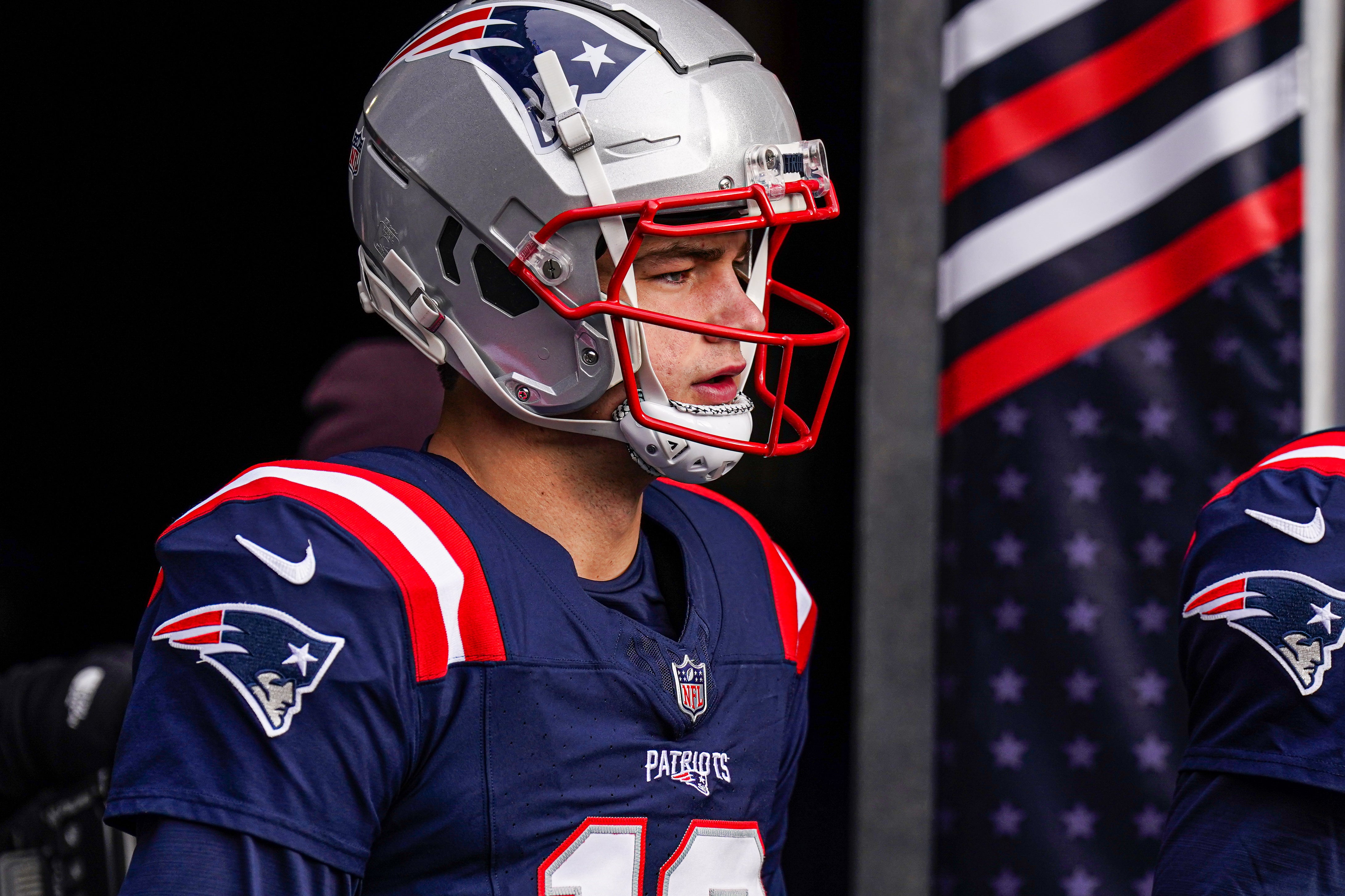 Jan 5, 2025; Foxborough, Massachusetts, USA; New England Patriots quarterback Drake Maye (10) walks to the field to warm up before the start of the game against the Buffalo Bills at Gillette Stadium.