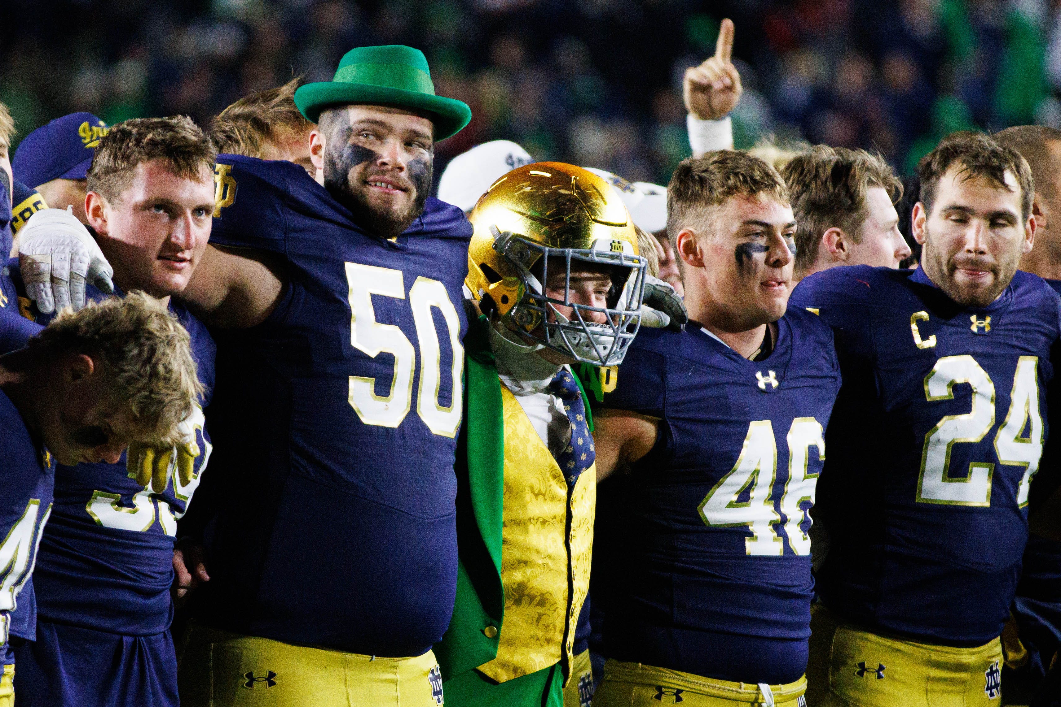 The Notre Dame Leprechaun wears offensive lineman Rocco Spindler's (50) helmet after winning a NCAA college football game 52-3 against Florida State at Notre Dame Stadium on Saturday, Nov. 9, 2024, in South Bend.