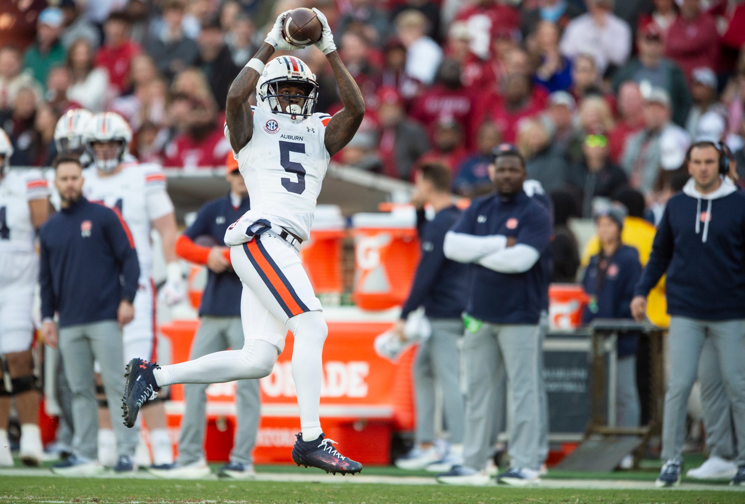 Auburn Tigers wide receiver KeAndre Lambert-Smith (5) catches the ball as Auburn Tigers take on Alabama Crimson Tide at Bryant-Denny Stadium in Tuscaloosa, Ala., on Saturday, Nov. 30, 2024. Alabama Crimson Tide defeated Auburn Tigers 28-14.
