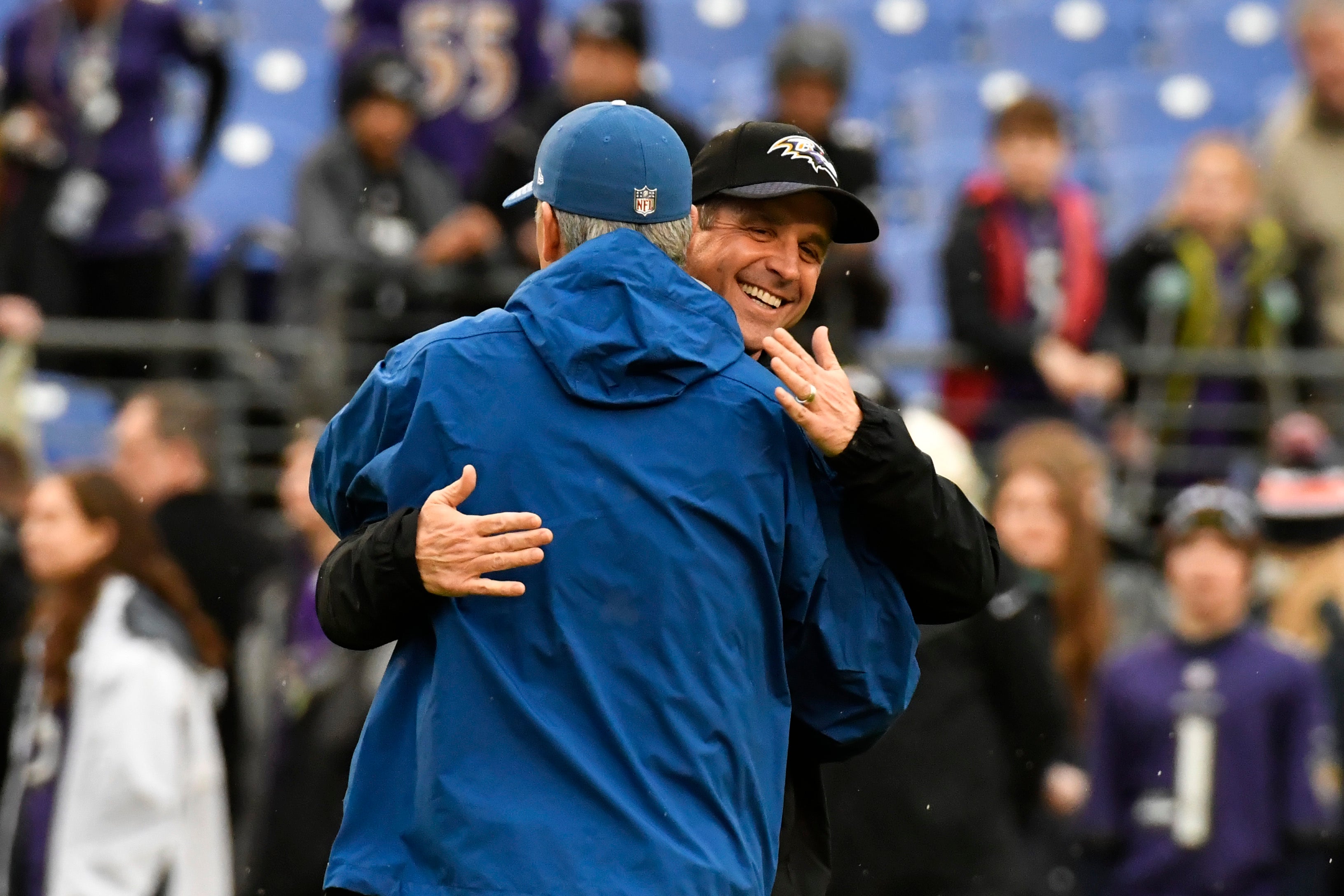 Dec 23, 2017; Baltimore, MD, USA; Baltimore Ravens head coach John Harbaugh and Indianapolis Colts head coach Chuck Pagano embrace prior to the start of the game at M&T Bank Stadium.