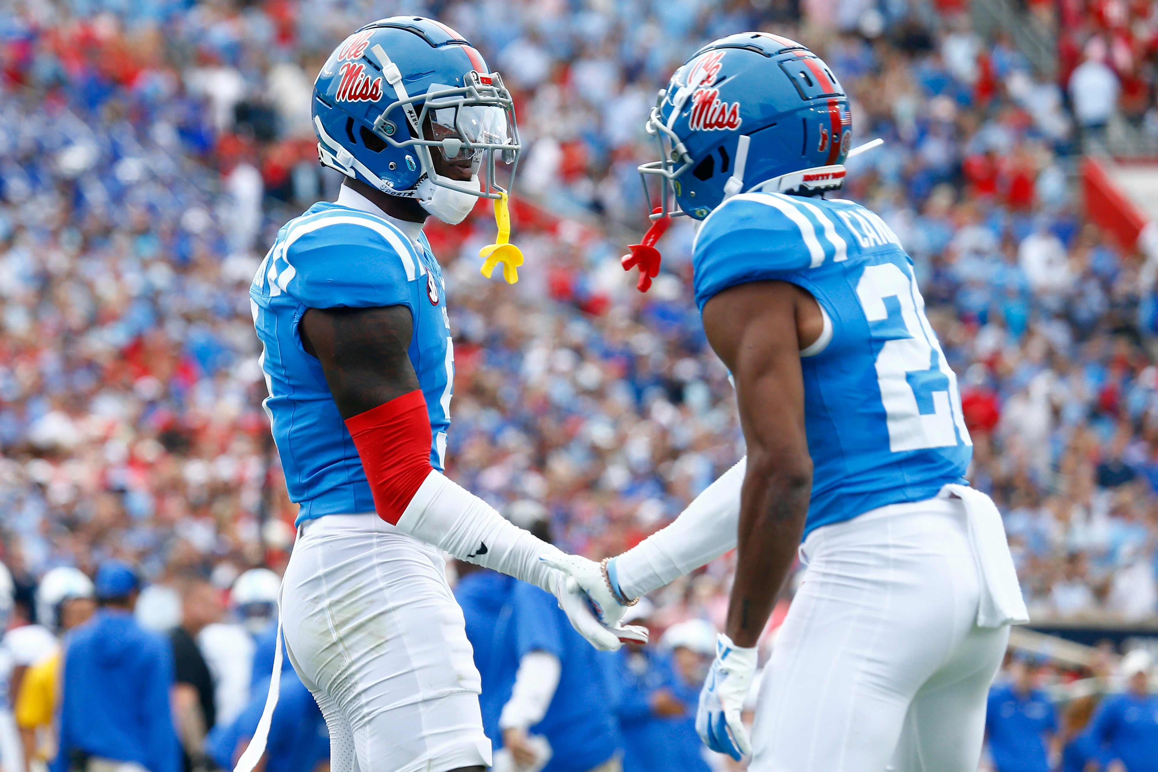 Mississippi Rebels defensive back Trey Amos (9) reacts with defensive back Jadon Canady (28) after a defensive stop during the first half against the Kentucky Wildcats at Vaught-Hemingway Stadium.