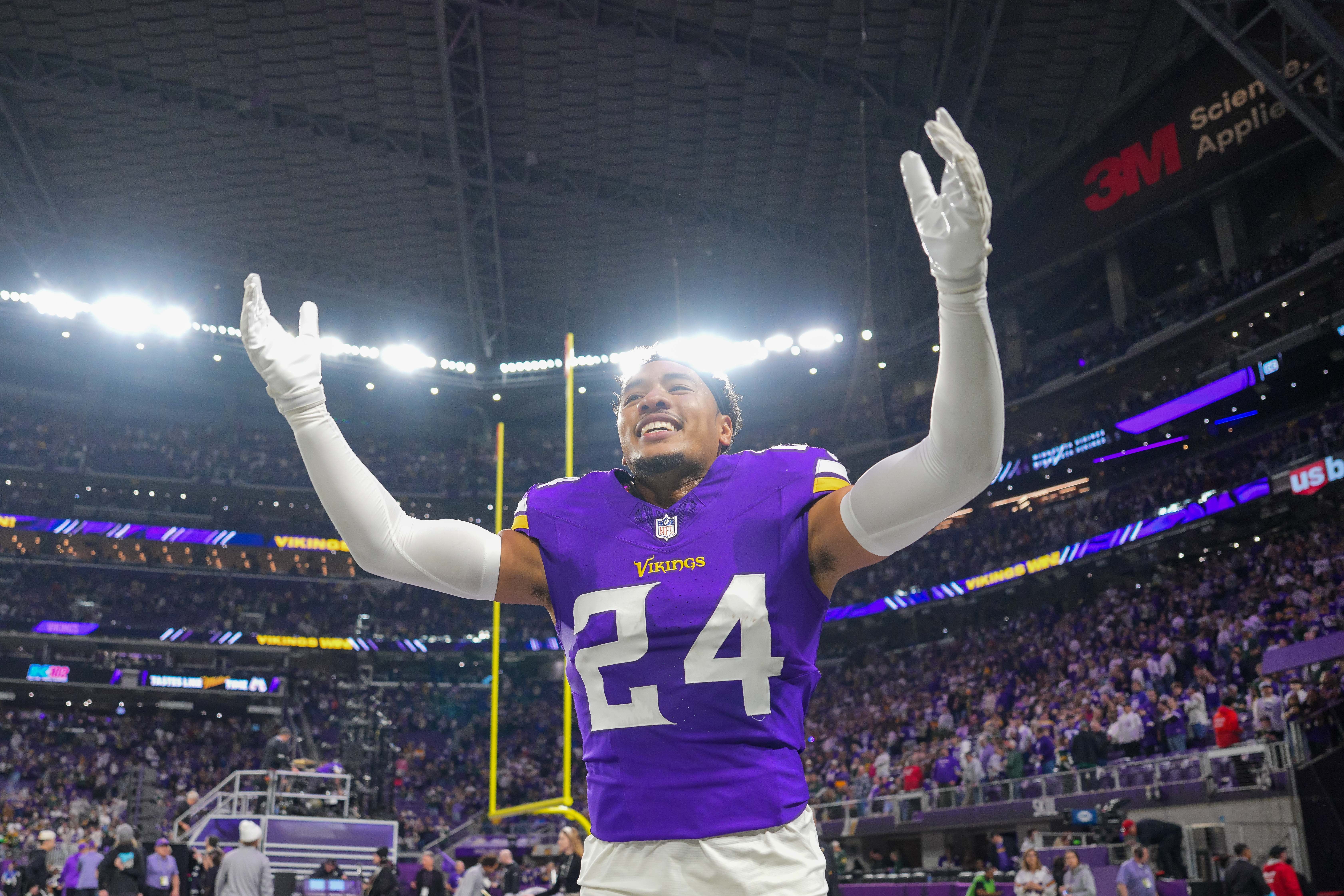Dec 29, 2024; Minneapolis, Minnesota, USA; Minnesota Vikings safety Camryn Bynum (24) celebrates after the game against Green Bay Packers at U.S. Bank Stadium.