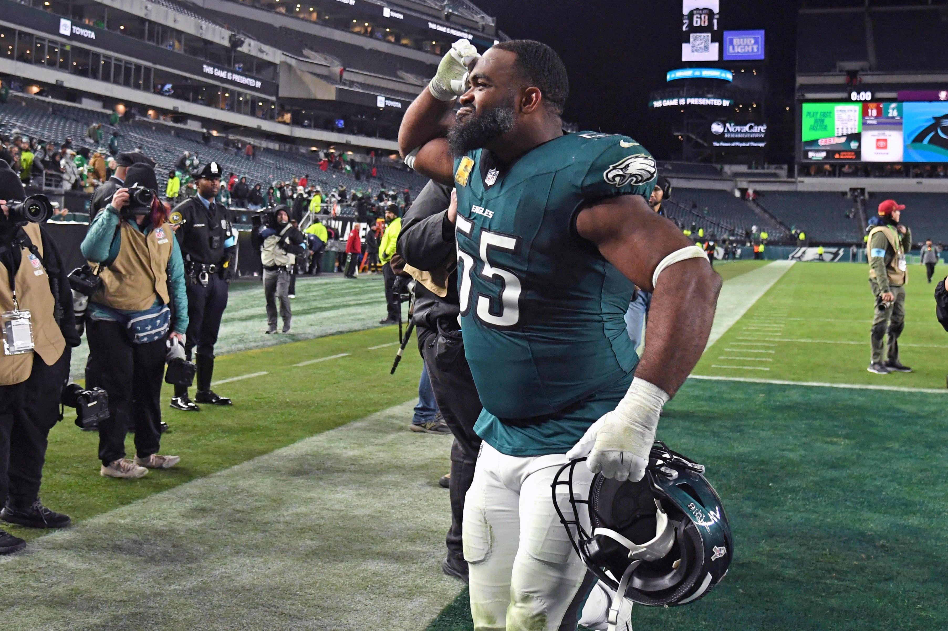 Philadelphia Eagles defensive end Brandon Graham (55) runs off the field after win against the Washington Commanders at Lincoln Financial Field.