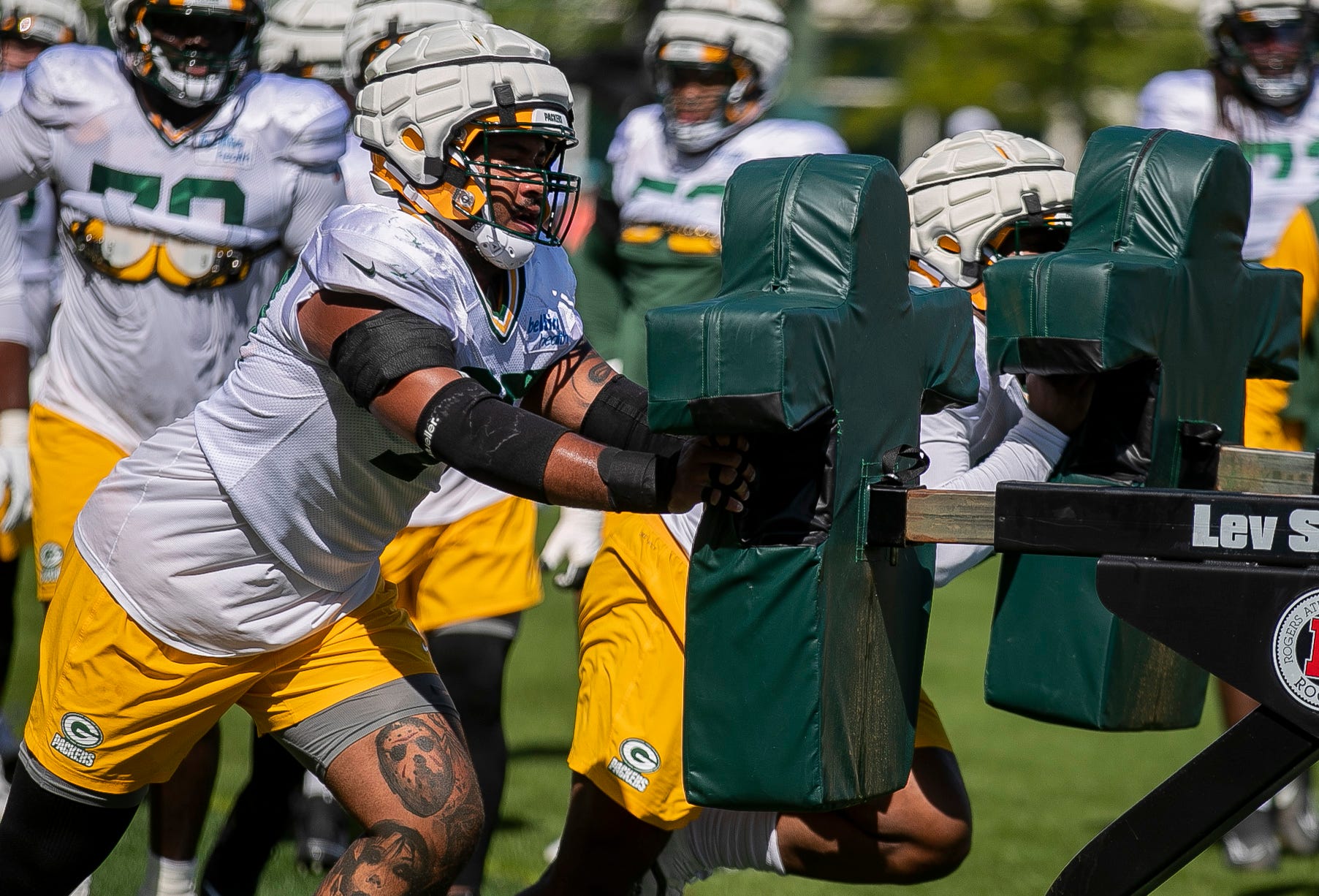 Green Bay Packers offensive lineman Jordan Morgan runs a drill during practice on Tuesday at Ray Nitschke Field in Ashwaubenon.