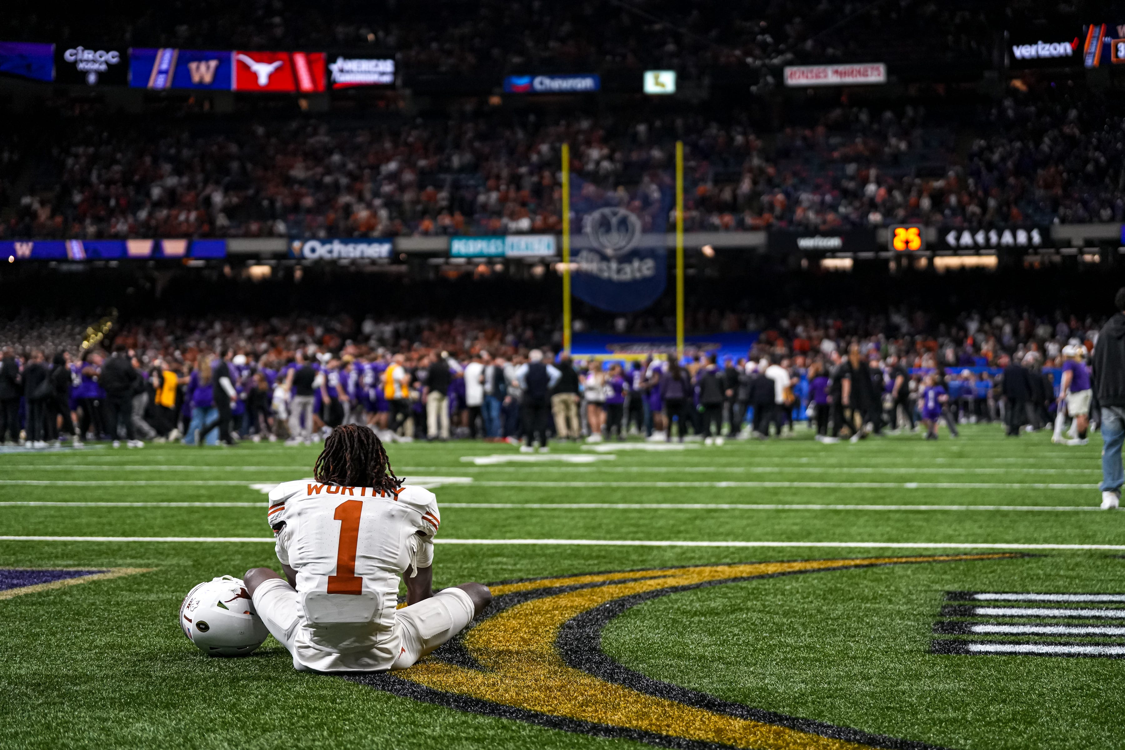 Texas Longhorns wide receiver Xavier Worthy (1) sits in the endzone after the 31-37 loss to the Washington Huskies in the Sugar Bowl College Football Playoff semifinals game at the Caesars Superdome on Monday, Jan. 1, 2024 in New Orleans, Louisiana.