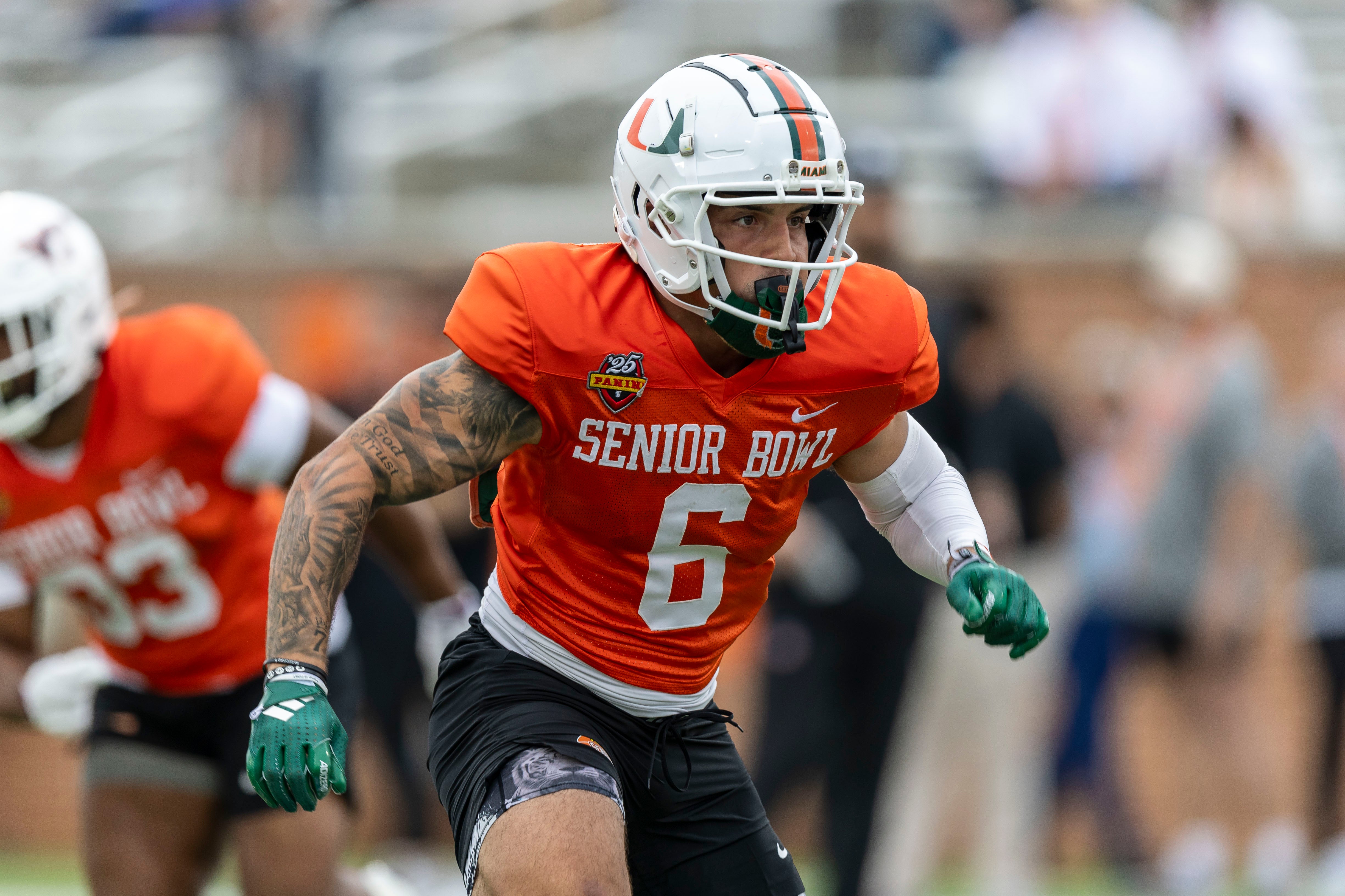 Jan 30, 2025; Mobile, AL, USA; National team wide receiver Xavier Restrepo of Miami (6) works through drills during Senior Bowl practice for the National team at Hancock Whitney Stadium.