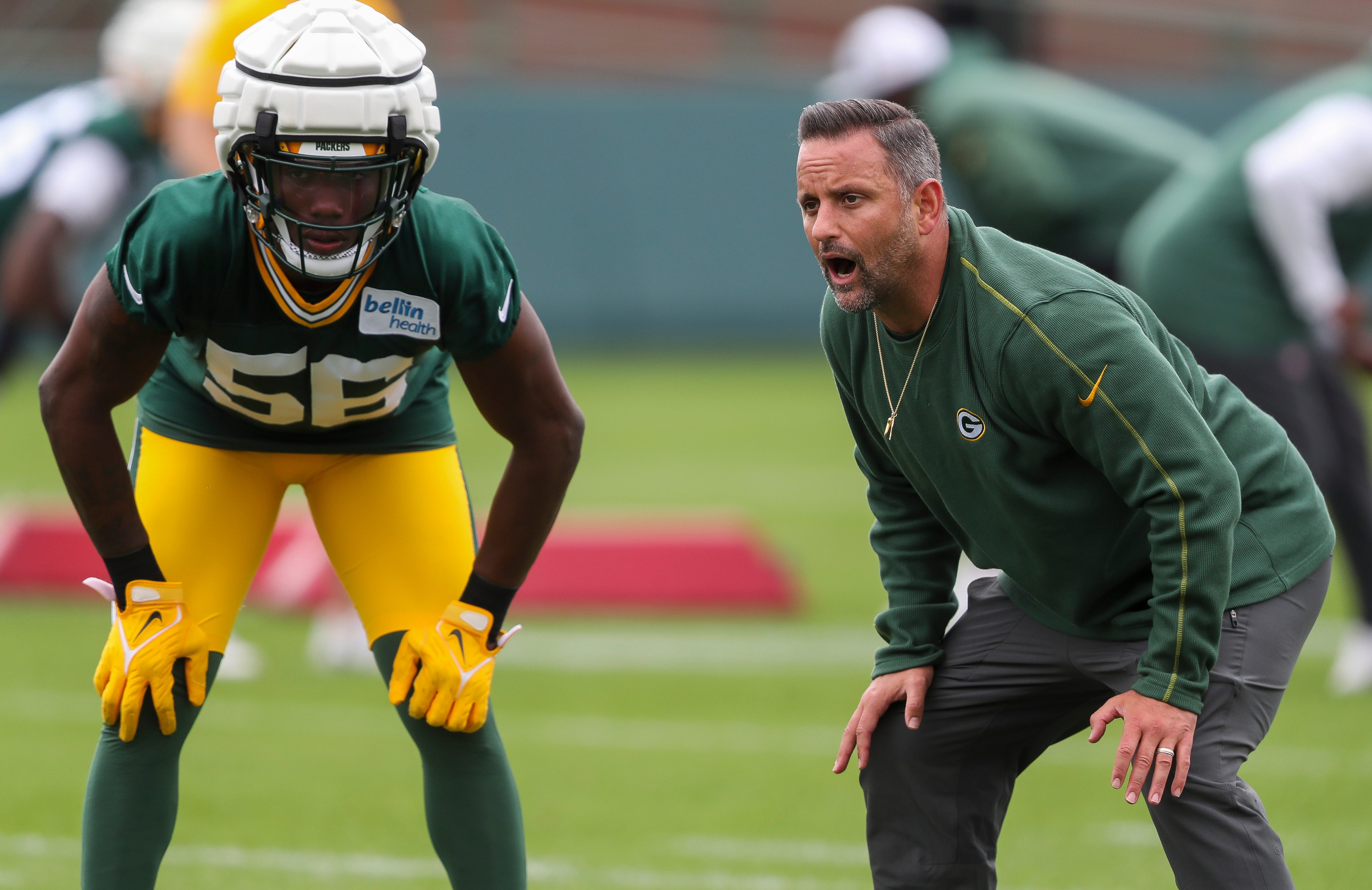 Green Bay Packers linebackers coach and defensive running game coordinator Anthony Campanile leads players through a drill on Wednesday, July 24, 2024, at Ray Nitschke Field in Green Bay, Wis.