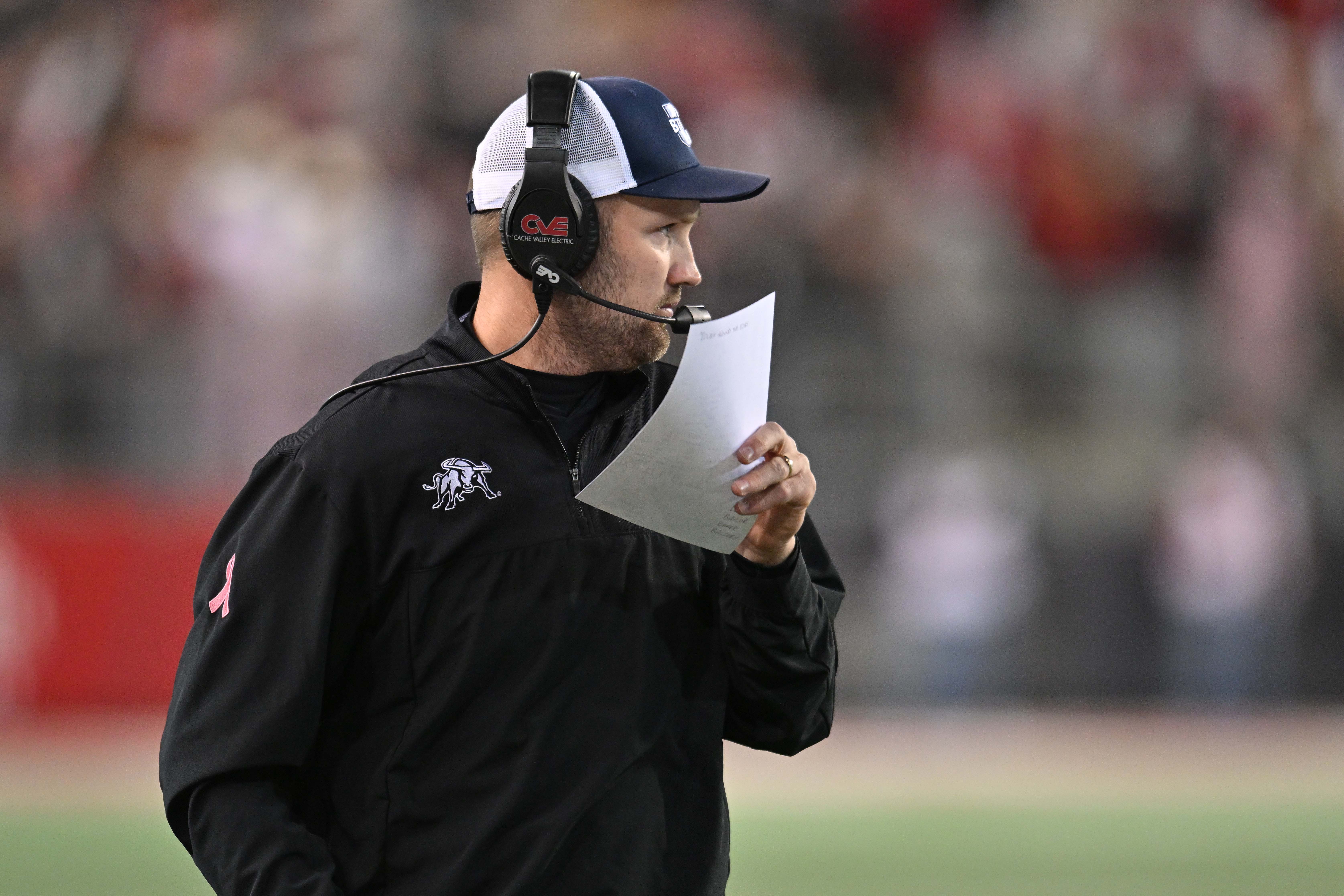 Nov 9, 2024; Pullman, Washington, USA; Utah State Aggies head coach Nate Dreiling looks on against the Washington State Cougars in the first half at Gesa Field at Martin Stadium.