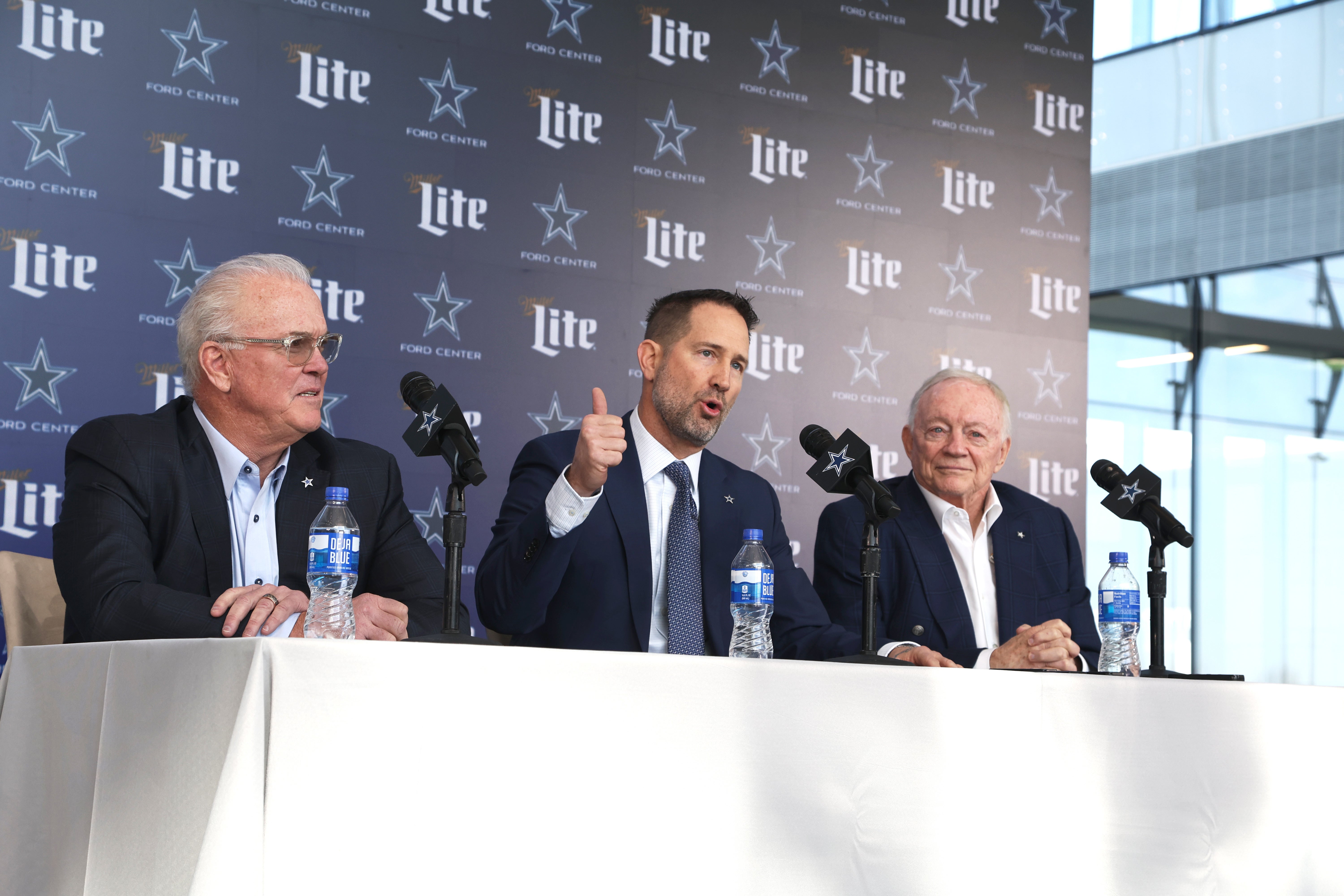 Dallas Cowboys CEO Stephen Jones, head coach Brian Schottenheimer and owner Jerry Jones speak to the media at a press conference at the Star.