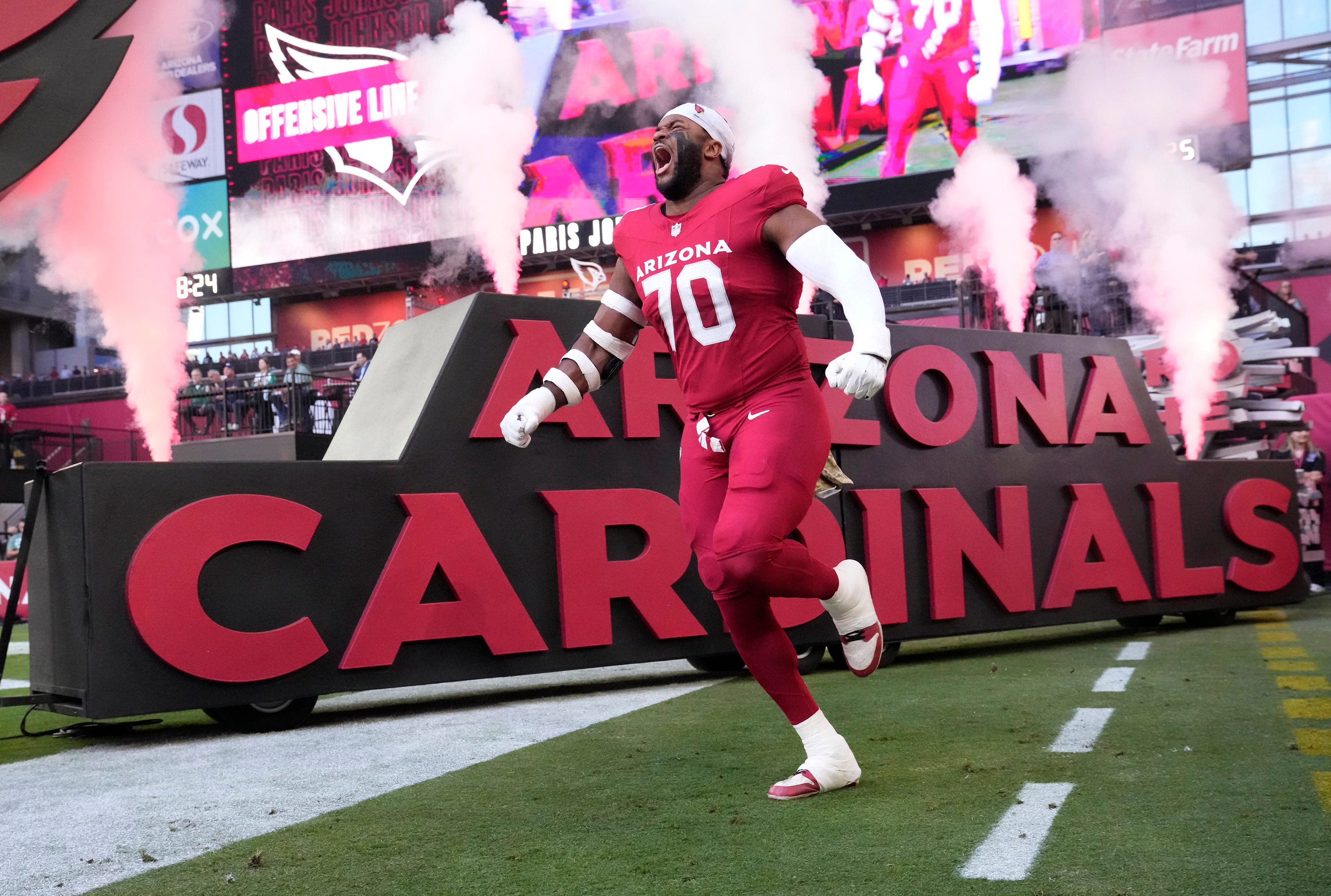 Arizona Cardinals offensive tackle Paris Johnson Jr. (70) is introduced before playing against the New York Jets at State Farm Stadium in Glendale on Nov. 10, 2024.