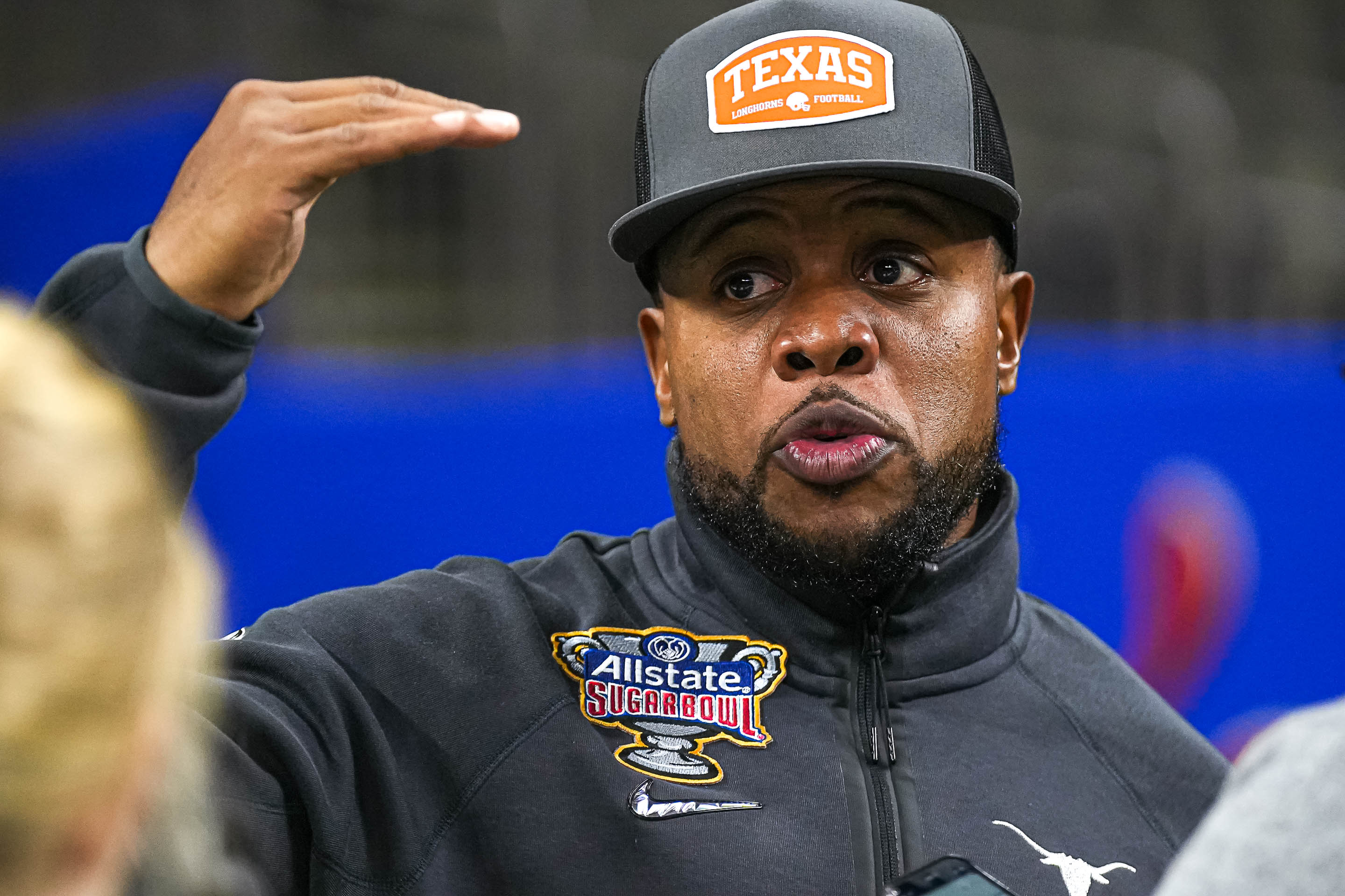 Texas Longhorns running backs coach Tashard Choice speaks to media at Texas Media Day at the Superdome.