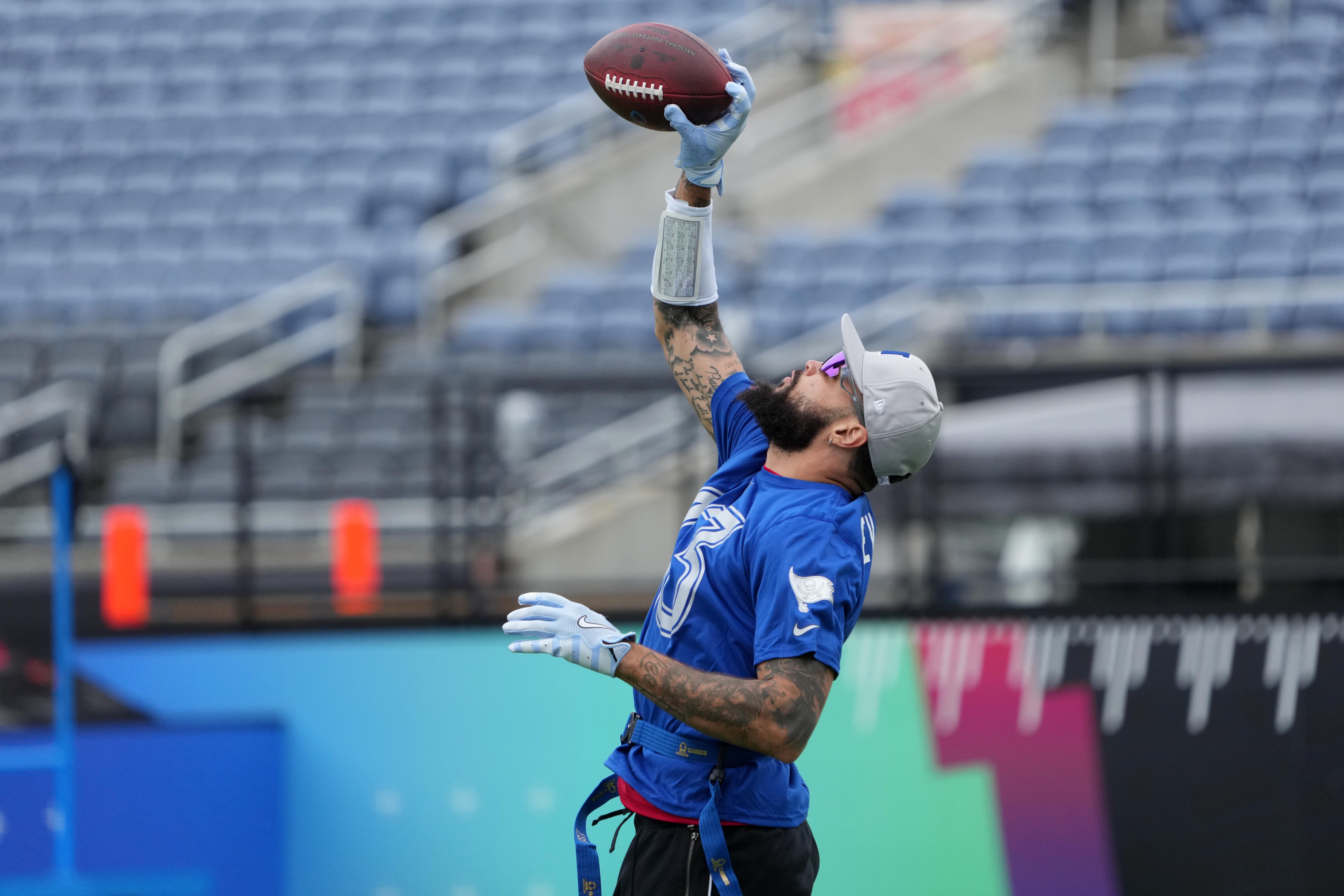 Feb 1, 2025; Orlando, FL, USA; Tampa Bay Buccaneers receiver Mike Evans (13) catches the ball during NFC Practice for the Pro Bowl Games at Camping World Stadium.
