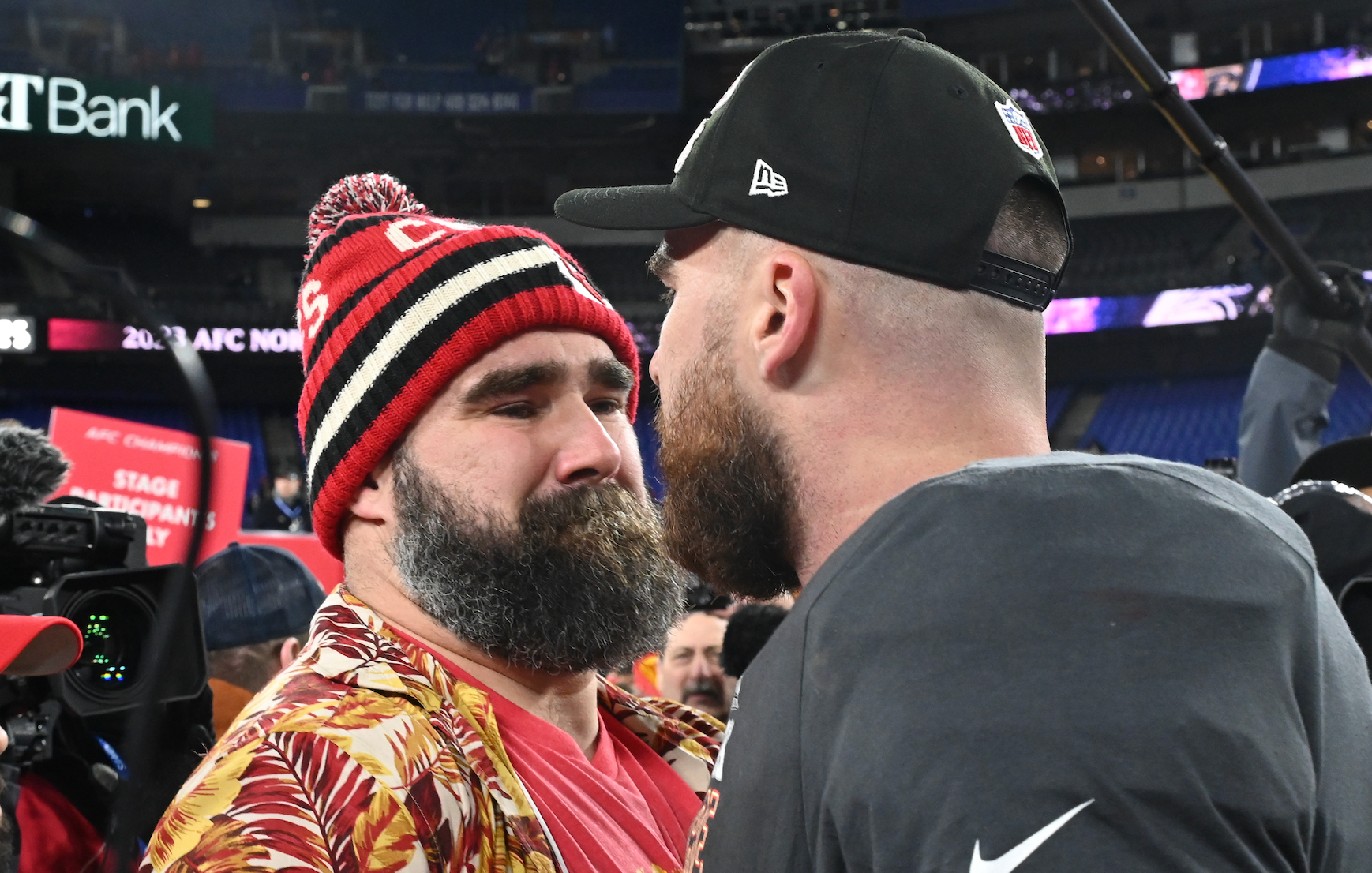 Jan 28, 2024; Baltimore, Maryland, USA; Kansas City Chiefs tight end Travis Kelce (87) celebrates with Jason Kelce (center) after the Kansas City Chiefs won the AFC Championship football game against the Baltimore Ravens at M&T Bank Stadium.