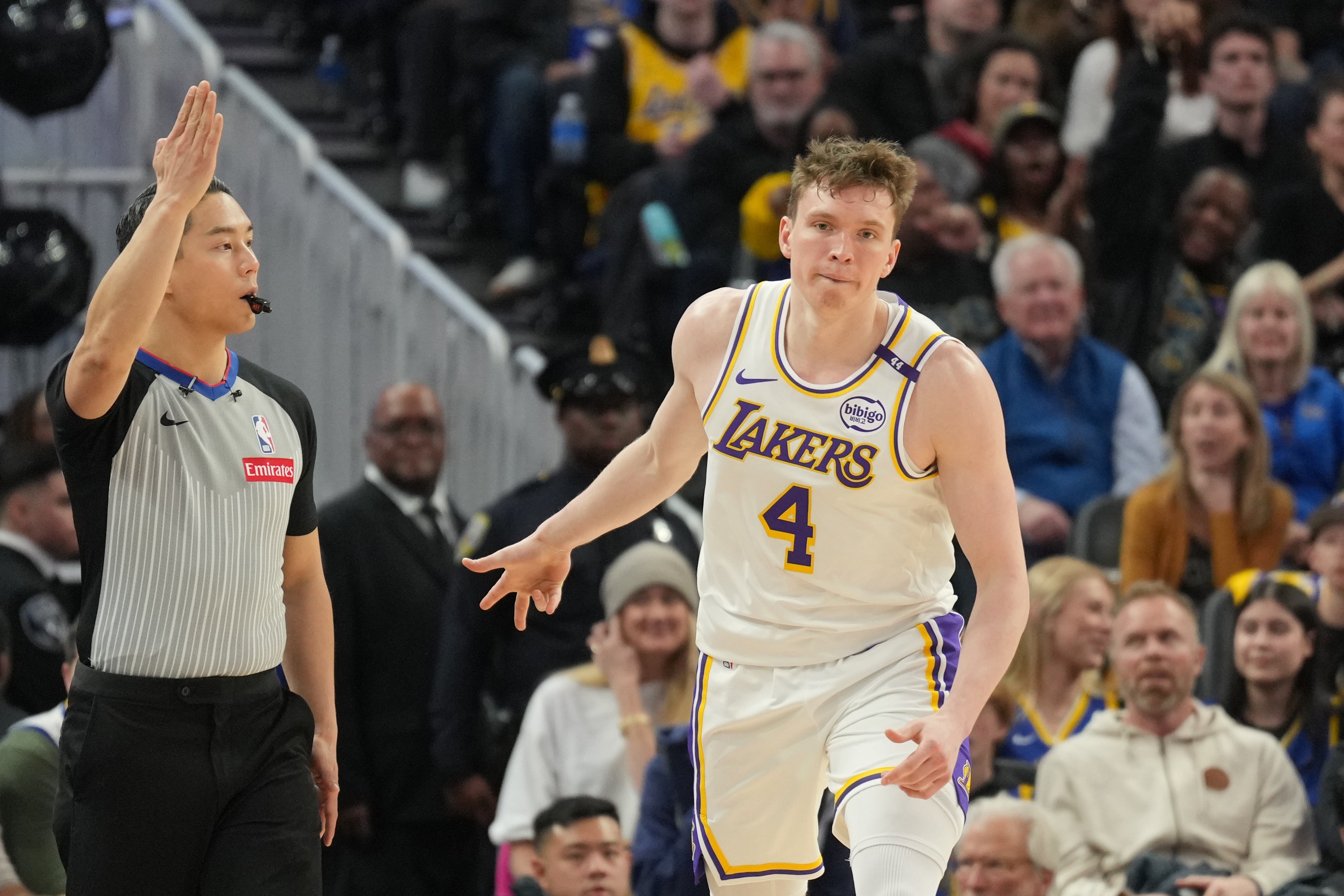 Jan 25, 2025; San Francisco, California, USA; Los Angeles Lakers guard Dalton Knecht (4) gestures after making a three point basket against the Golden State Warriors during the third quarter at Chase Center.