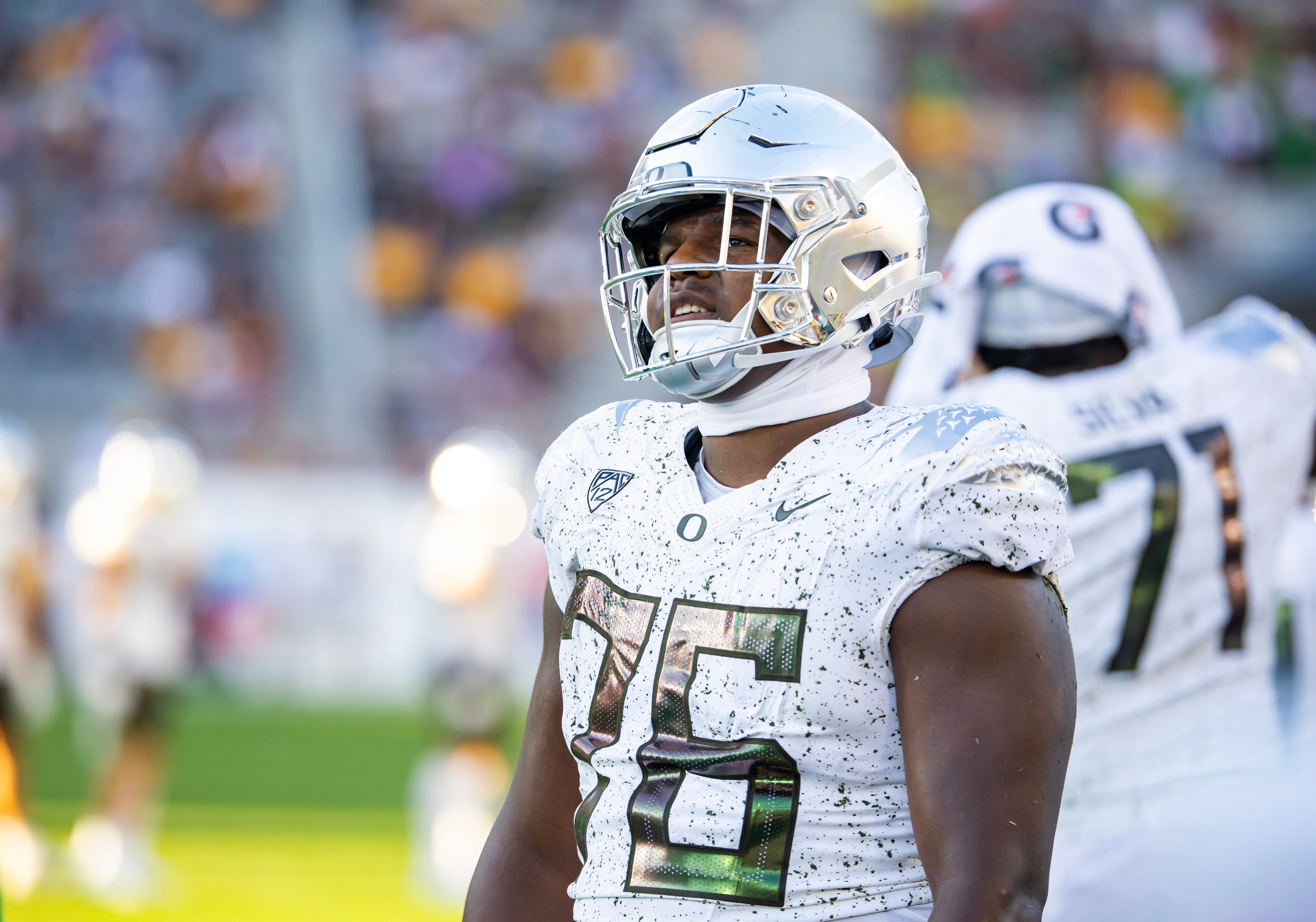 Nov 18, 2023; Tempe, Arizona, USA; Oregon Ducks offensive lineman Josh Conerly Jr. (76) against the Arizona State Sun Devils at Mountain America Stadium. Mandatory Credit: Mark J. Rebilas-Imagn Images